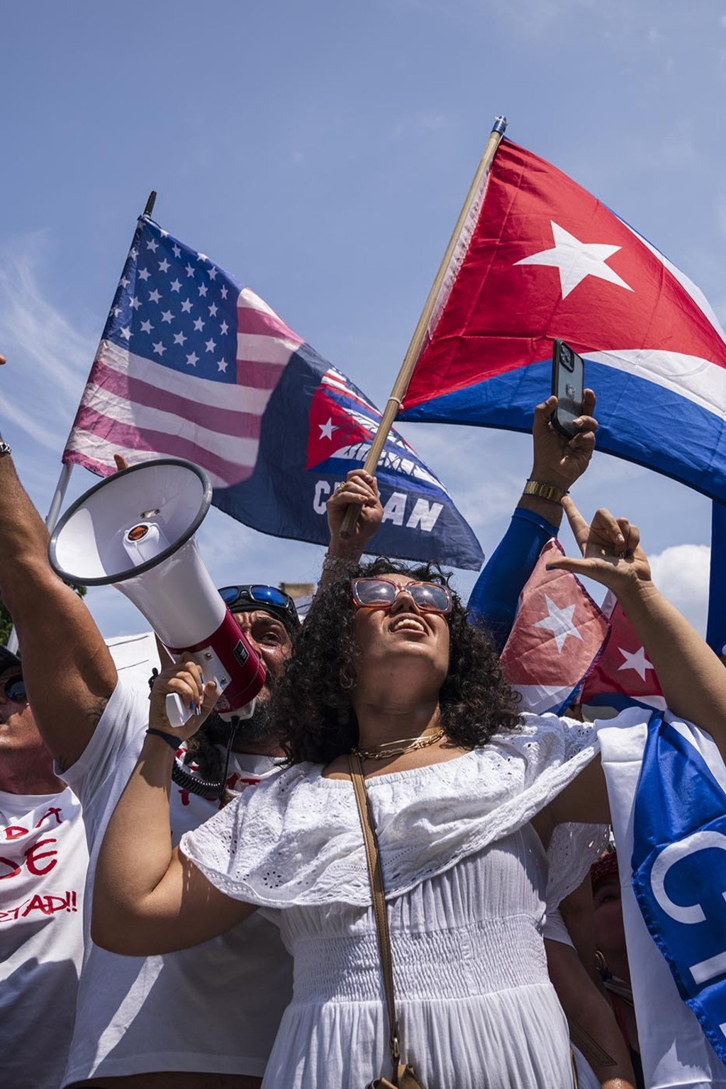 <p><span style="font-weight: 400;">Cuban activists and supporters rally outside the Cuban Embassy during a freedom rally in Washington, DC, July 26, 2021.</span></p>
