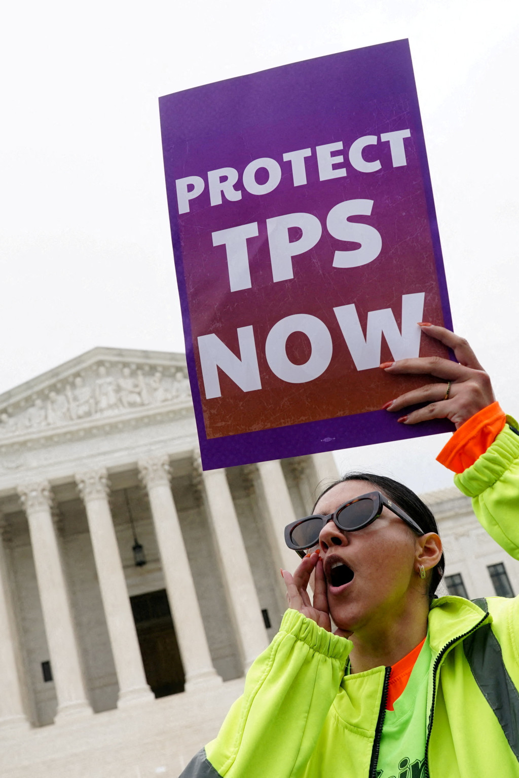 <p>A woman holds a placard as immigrants’ rights activists and demonstrators attend a rally outside the U.S. Supreme Court in Washington, D.C., on April 29, 2026.</p>