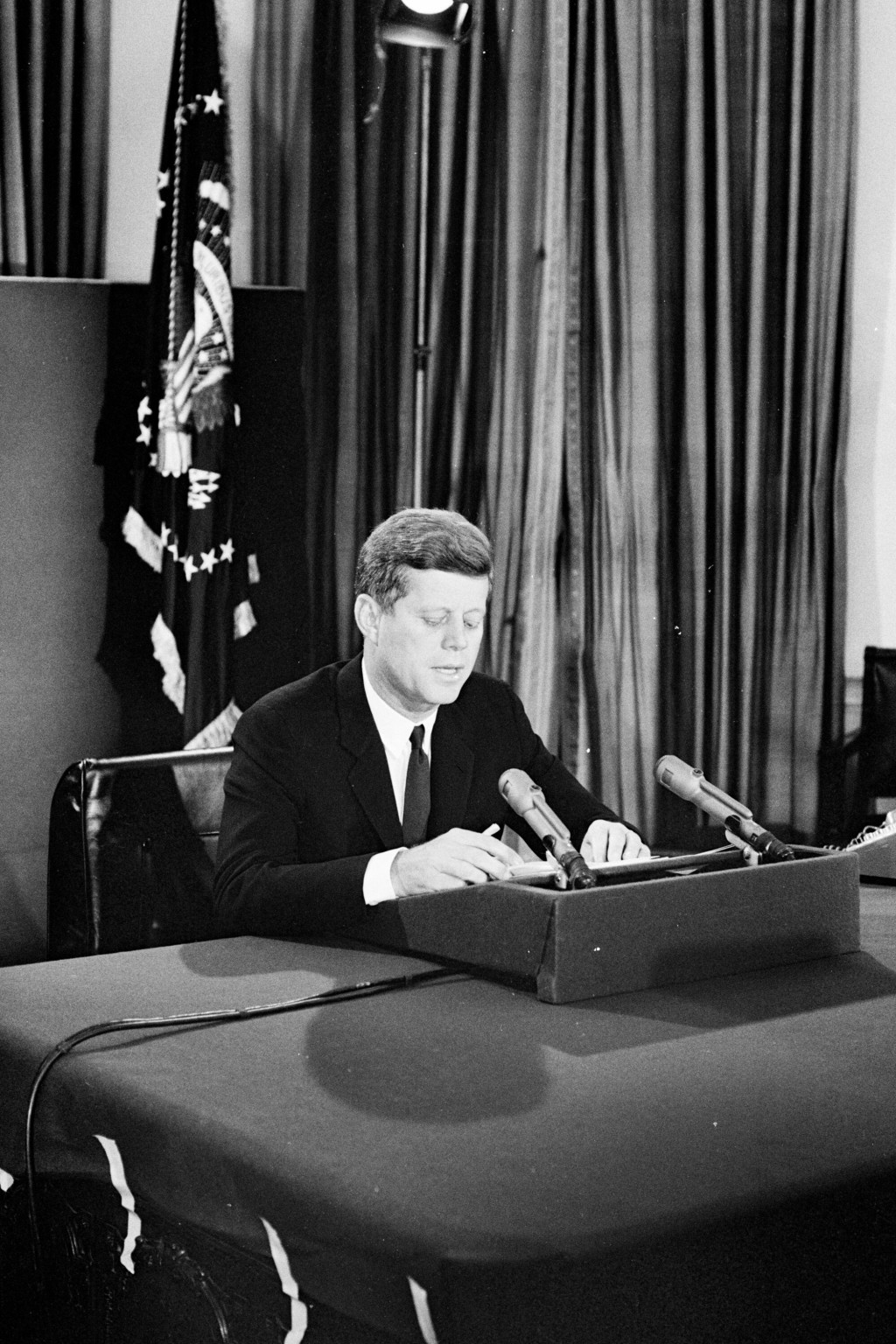 <p>President John F. Kennedy addresses the nation on the Soviet Union’s deployment of nuclear-armed ballistic missiles in Cuba, October 22, 1962.</p>
