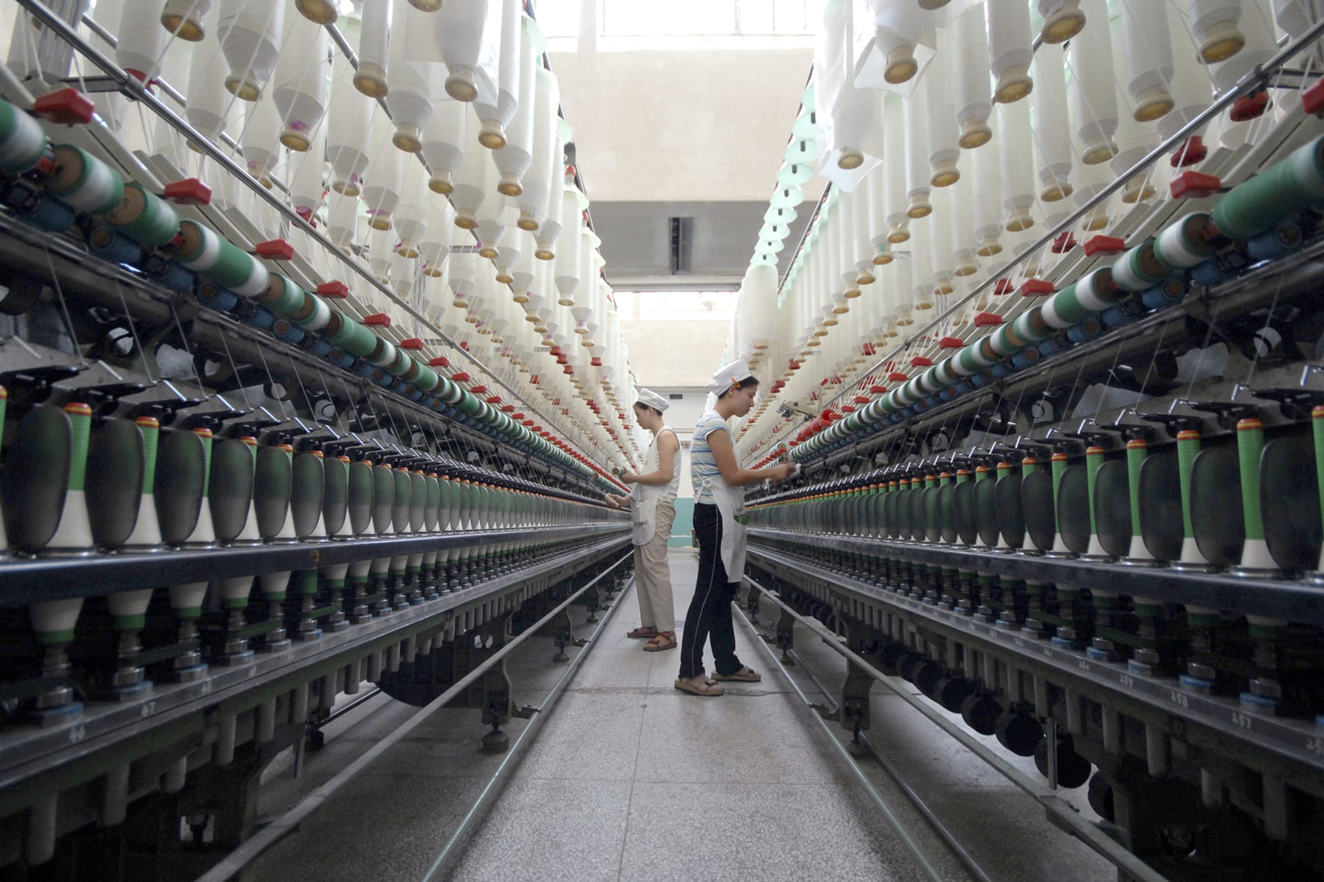 Employees work at a textile factory in Xiangfan