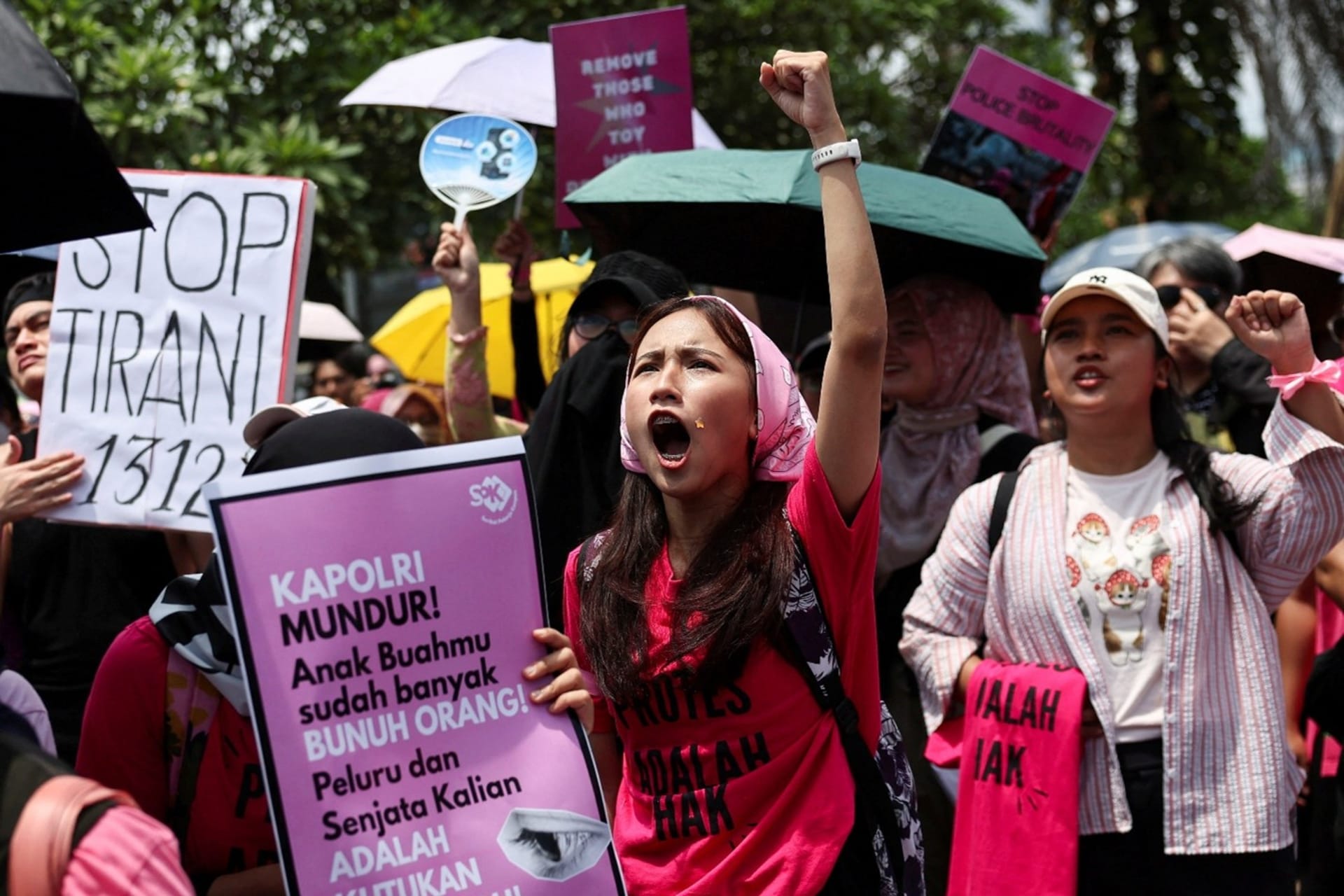 <p>Activists shout slogans during a protest against lawmakers’ perks and police brutality outside the Indonesian parliament building in Jakarta, Indonesia.</p>
