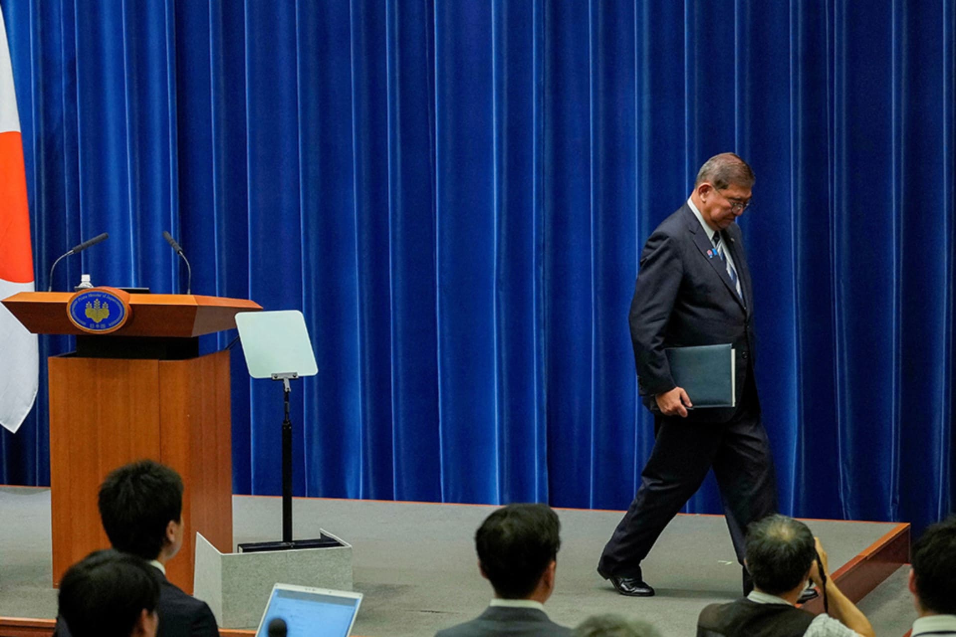 <p>Japanese Prime Minister Ishiba Shigeru walks on the day of a press conference as he announces his resignation, in Tokyo, Japan, on September 7.</p>
