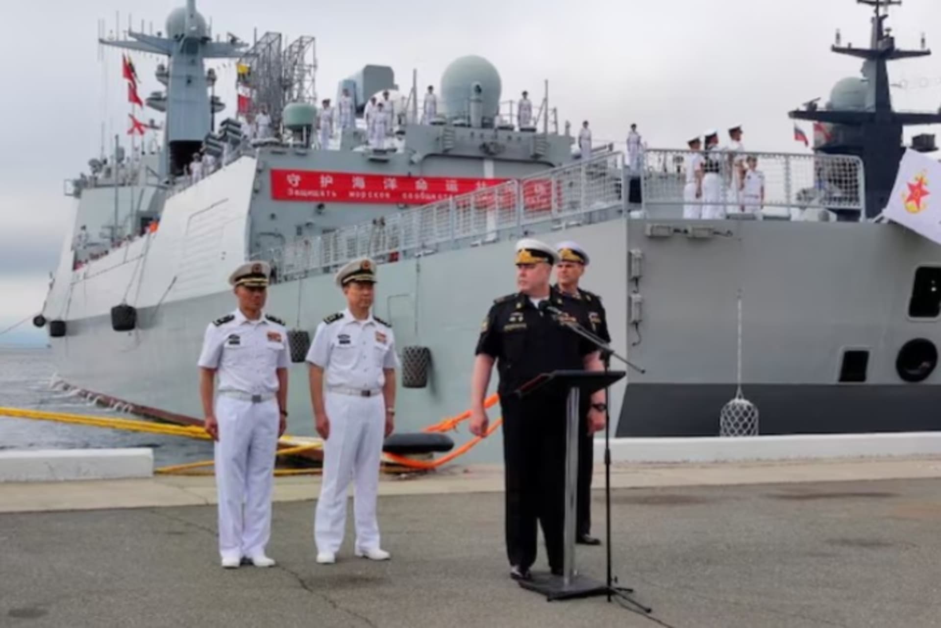 <p>Chinese and Russian naval officers take part in a ceremony marking the start of joint naval drills in the Sea of Japan.</p>

