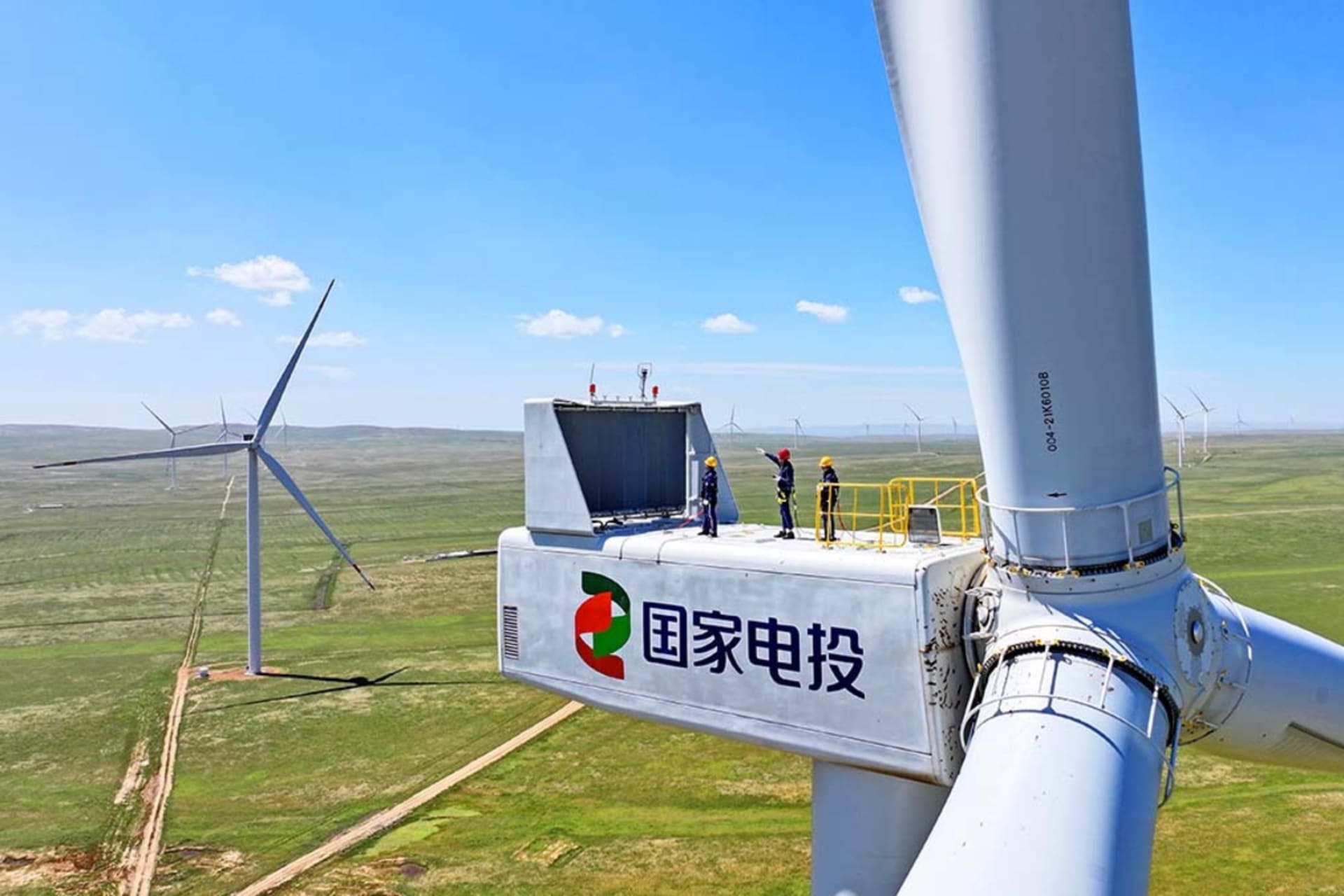 <p>Workers at a wind power base conduct maintenance on turbine generators more than 110 meters high in Ulanqab City, Inner Mongolia Autonomous Region, China, on August 12, 2025.</p>
