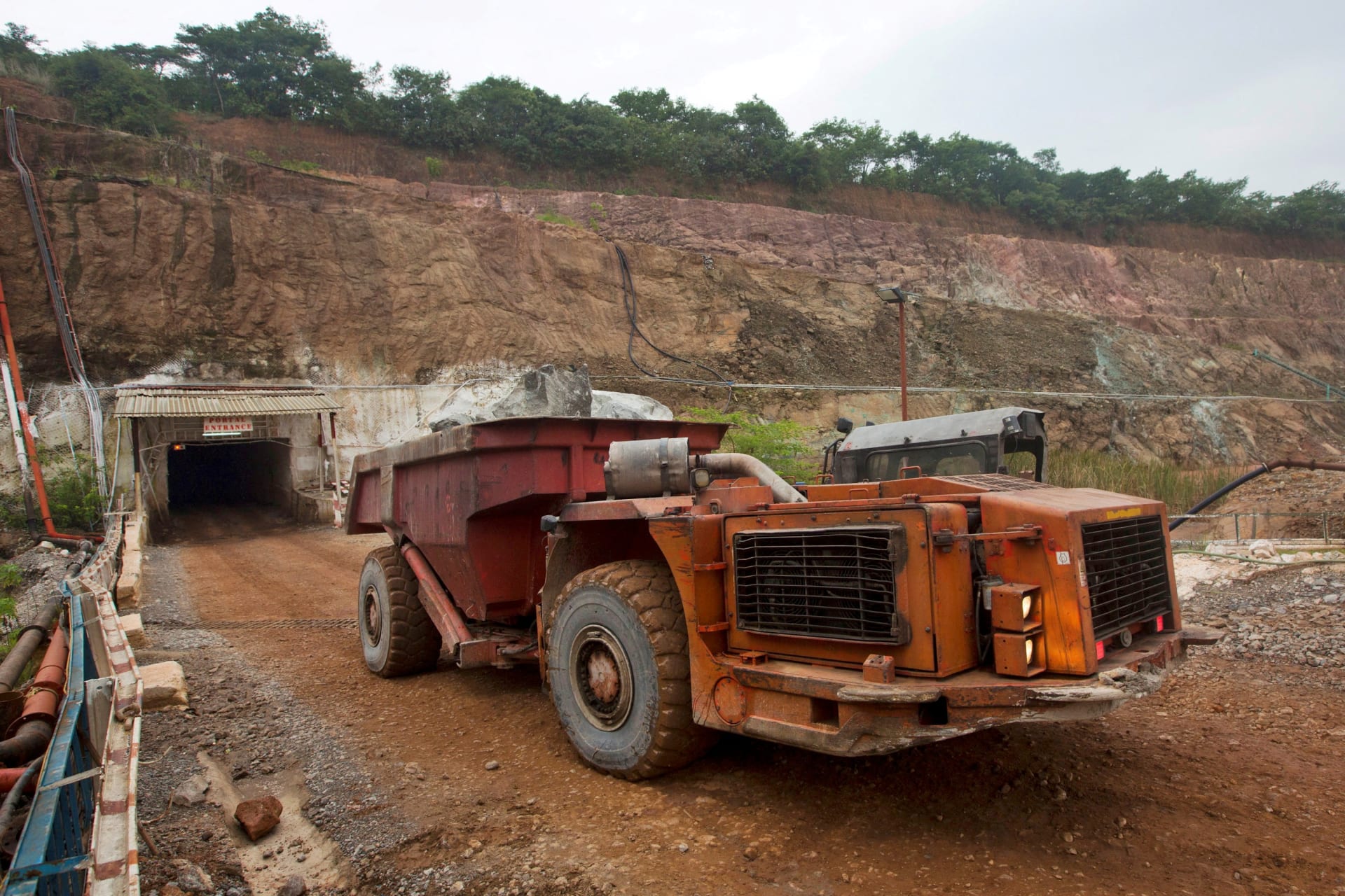 <p> A truck exits after collecting ore from 516 metres below the surface at the Chibuluma copper mine in the Zambian copperbelt region on January 17, 2015.</p>
