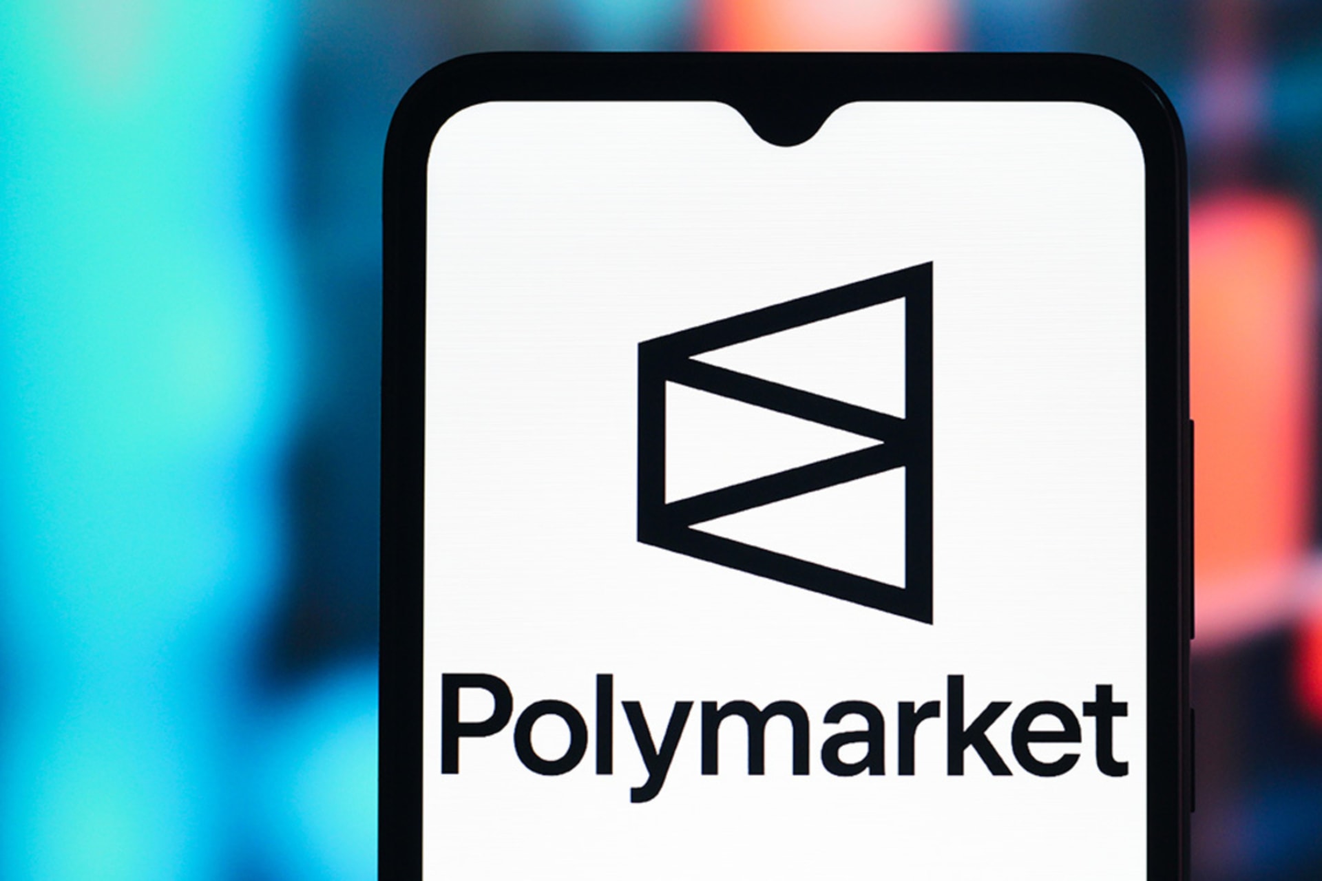<p>The Polymarket logo is seen displayed on a smartphone screen. </p>
