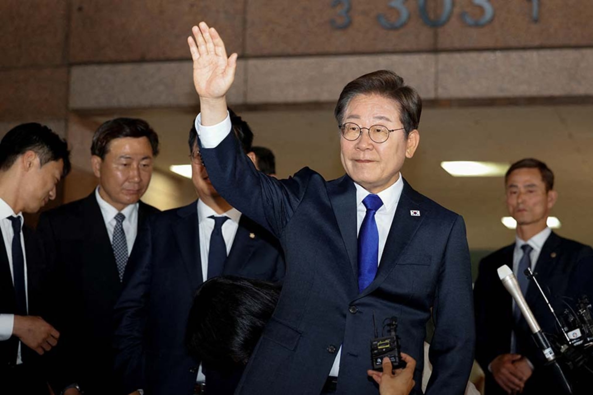 Lee Jae-myung, the president of South Korea's Democratic Party, waves as he leaves to meet his supporters, in Incheon, South Korea, June 3, 2025.