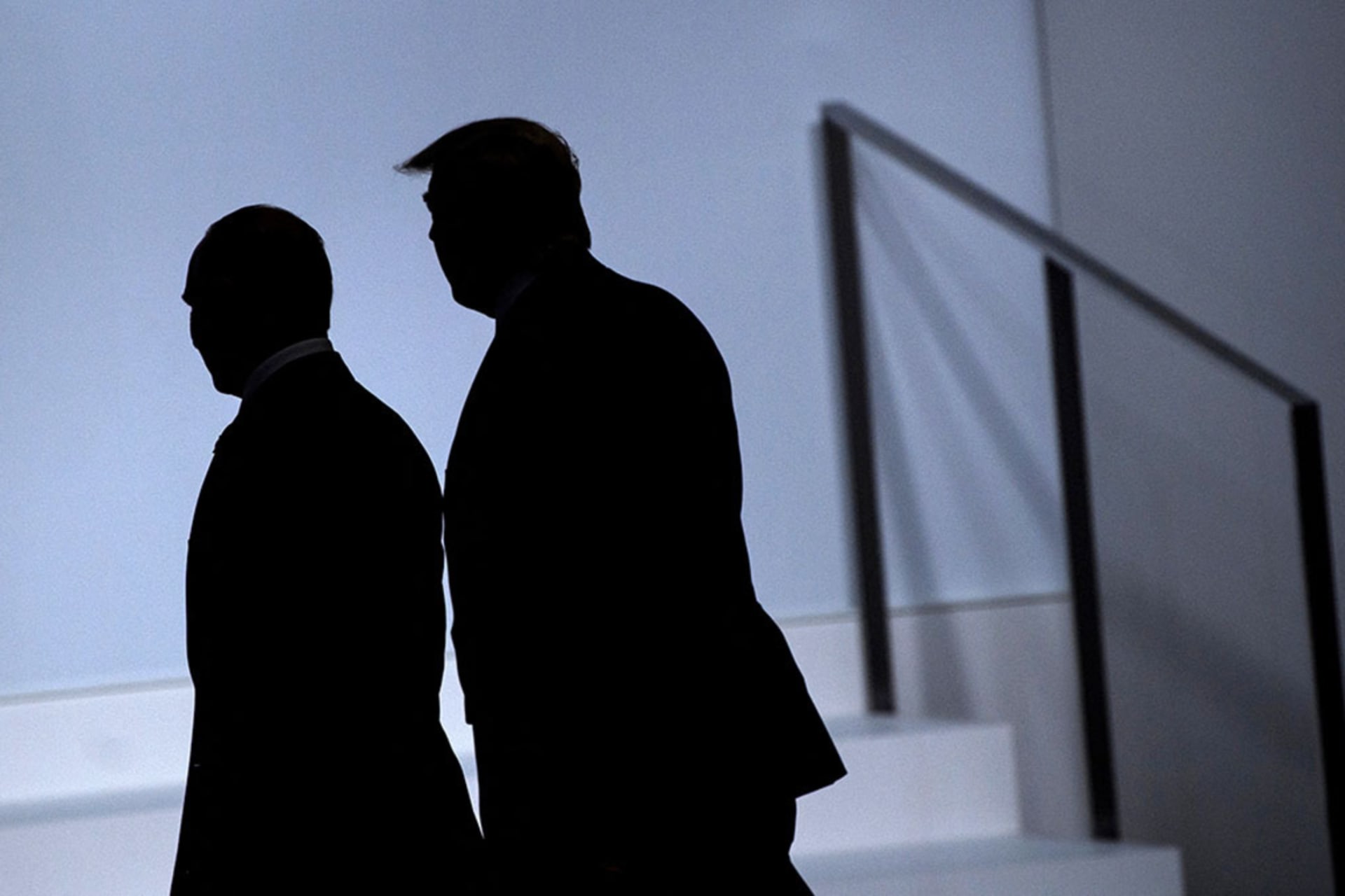 <p>Russia’s President Vladimir Putin (L) and US President Donald Trump arrive for a group photo at the G20 Summit in Osaka on June 28, 2019.</p>
