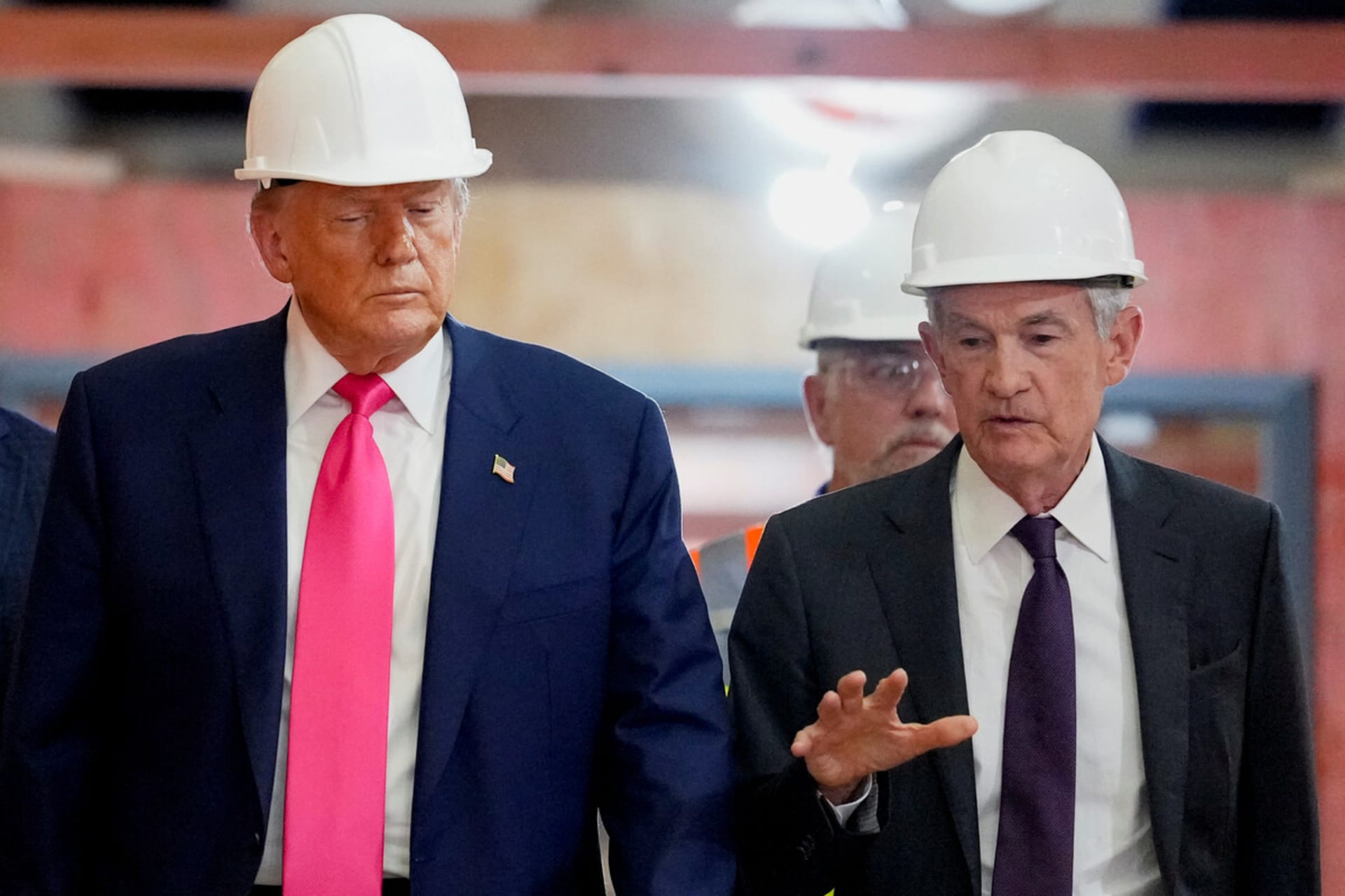 <p>Donald Trump and Fed Chair Jerome Powell walk through the Federal Reserve building on July 24 as it undergoes renovations.</p>

