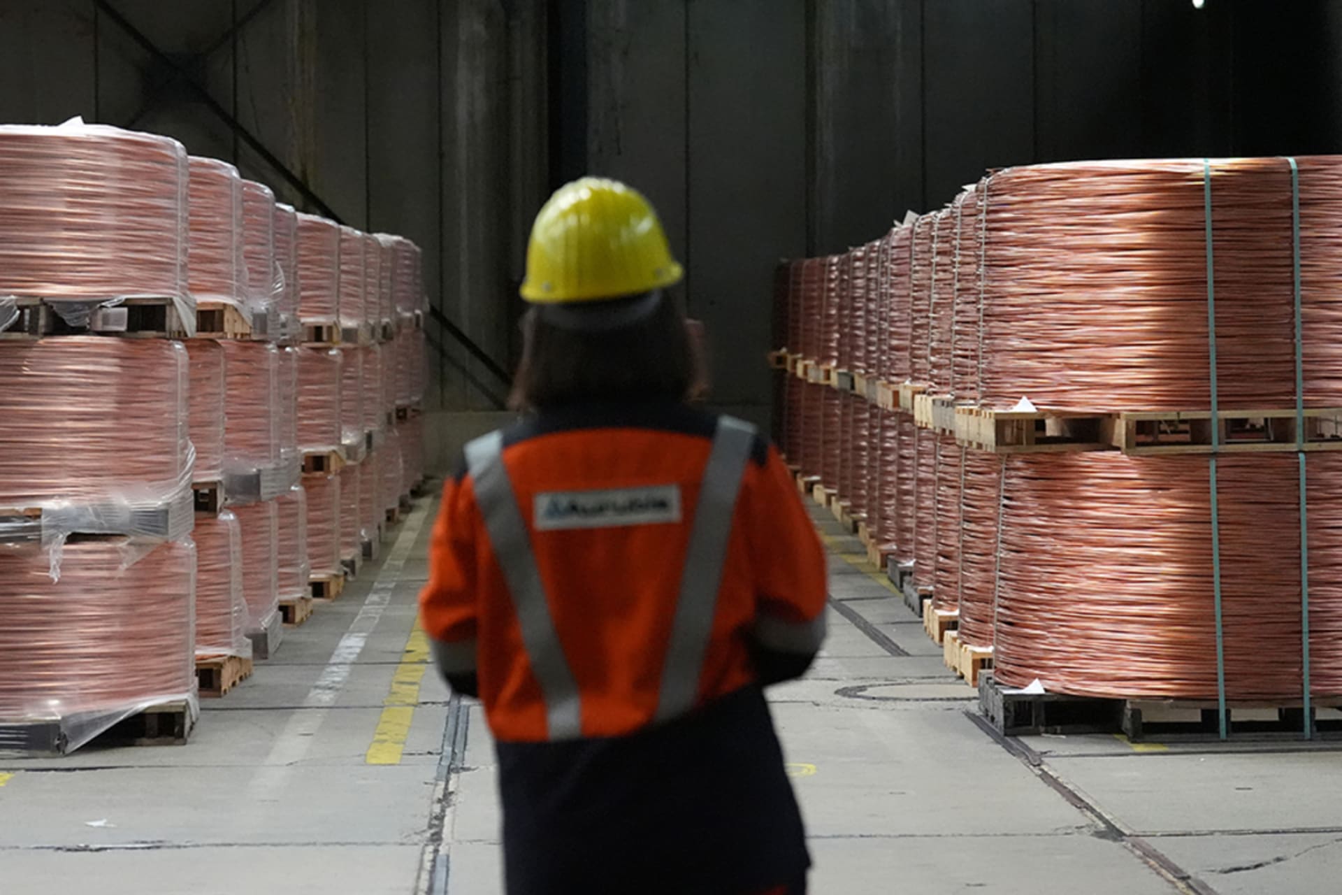 <p>Coiled copper wires lie on pallets in the wire plant at Aurubis AG, in Hamburg, Germany, July 16, 2015.</p>
