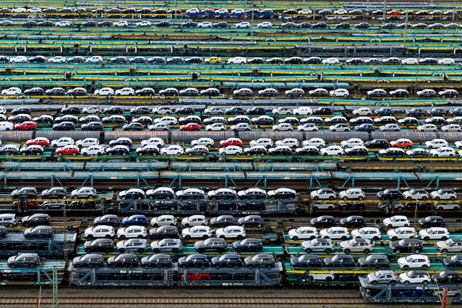 <p>Car trains are parked at the marshalling yard in the Gröpelingen district in Bremen, Germany, July 28, 2025.</p>

