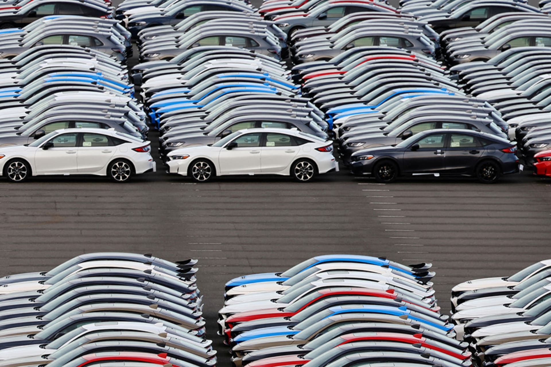 <p>Honda vehicles are lined up at a vehicle storage yard at an industrial port, on the day U.S. President Donald Trump struck a trade deal with Japan that lowers tariffs on auto imports, in Yokohama, Japan.</p>
