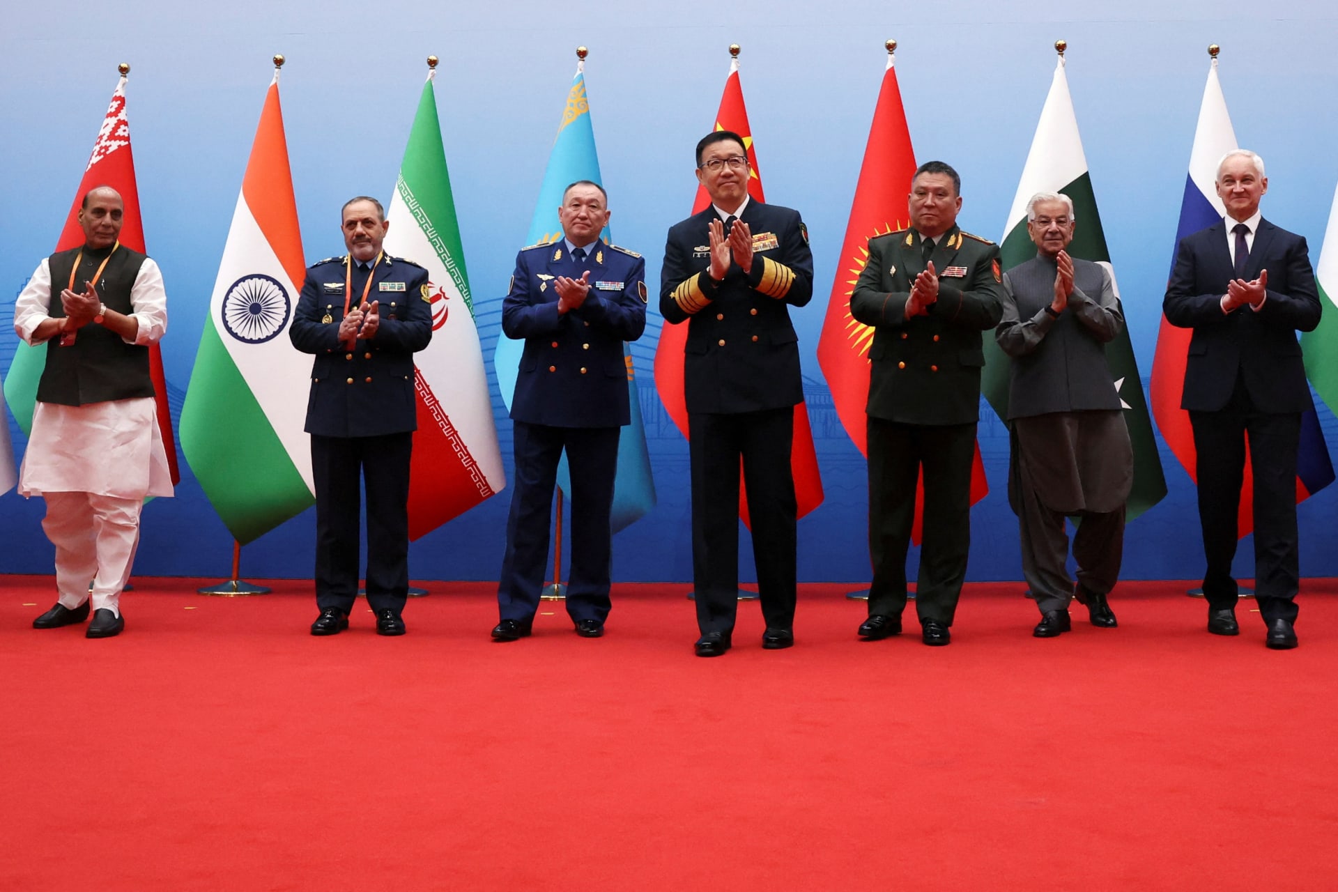 <p>Defence ministers applaud following a group photo, before the Shanghai Cooperation Organisation (SCO) Defence Ministers’ Meeting in Qingdao, Shandong province, China June 26, 2025.</p>
