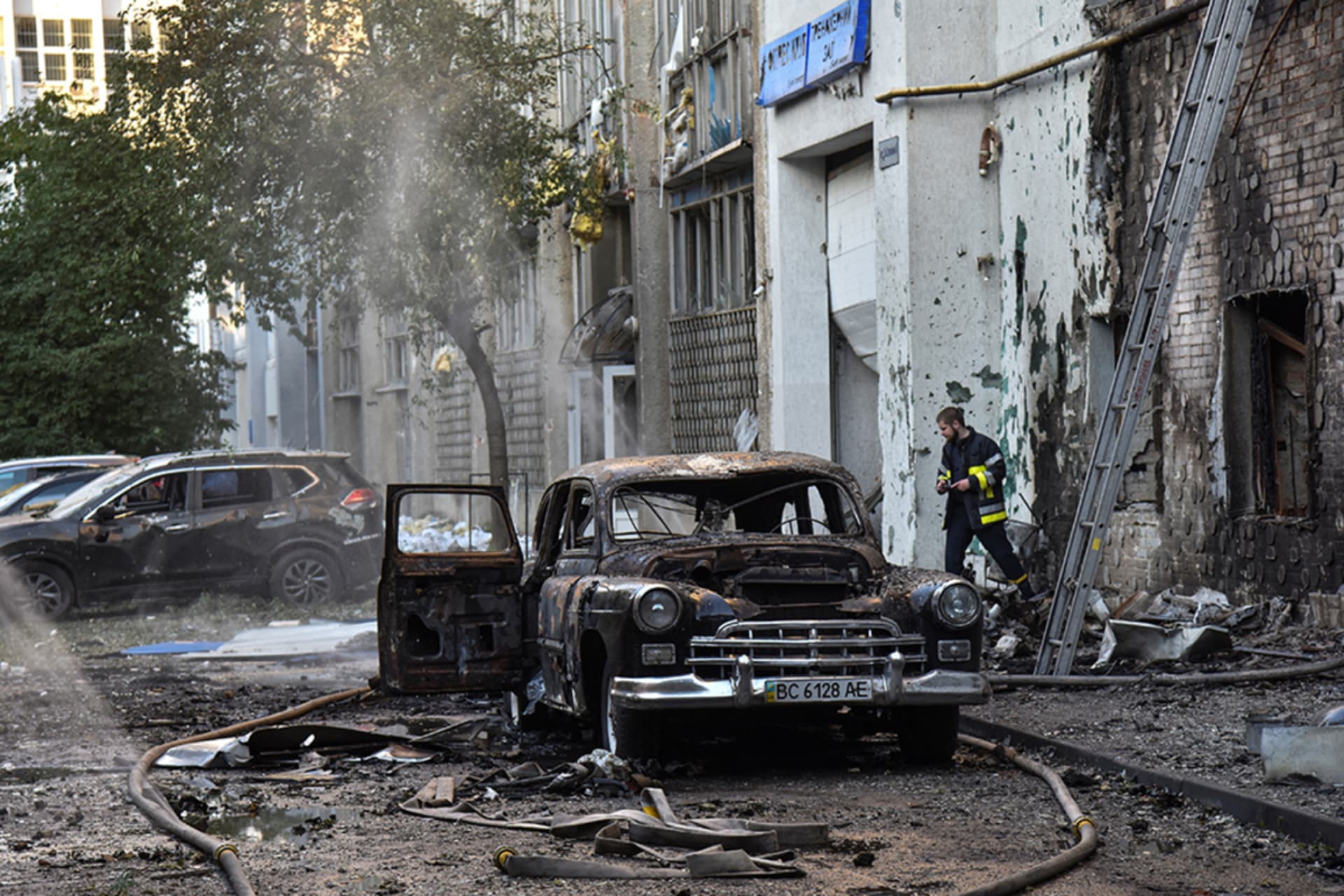 <p>A firefighter works at the site of buildings damaged during Russian drone and missile strikes in Lviv, Ukraine July 12, 2025.</p>
