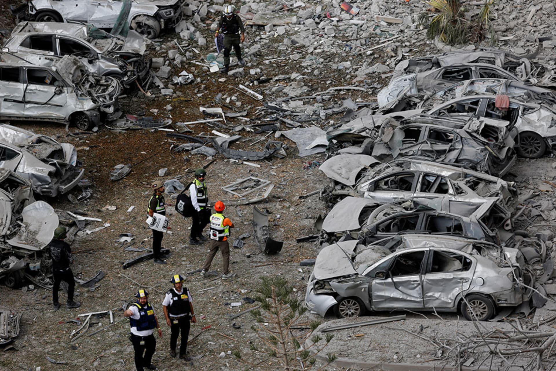 <p>Emergency personnel work amid debris at an impacted residential site in Be’er Sheva, Israel on June 24, 2025.</p>
