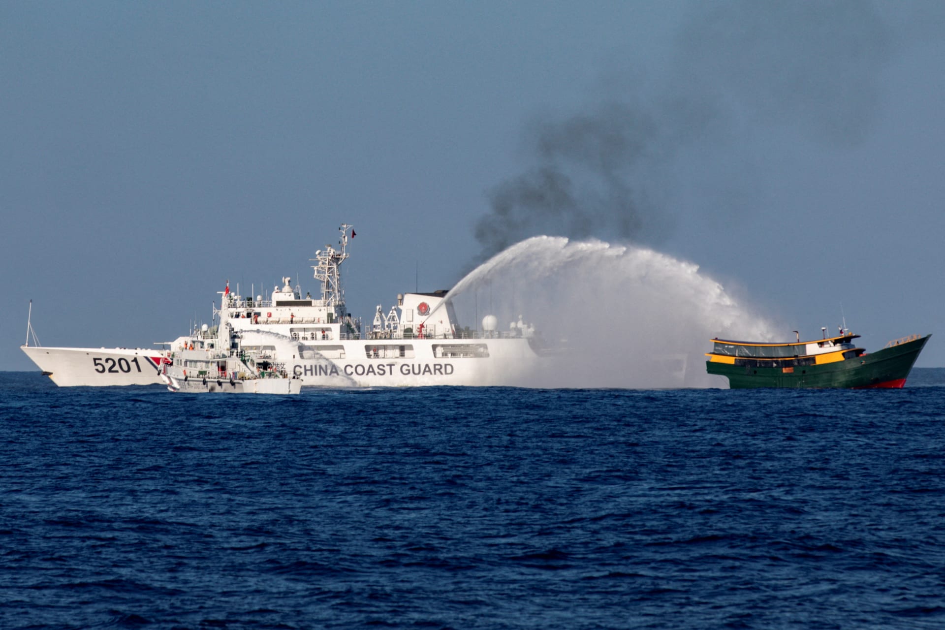 <p>A Chinese Coast Guard vessel fires water cannons at a Philippine ship on May 4, 2025, on its way to resupply the Philippine mission at Second Thomas Shoal in the South China Sea. </p>
