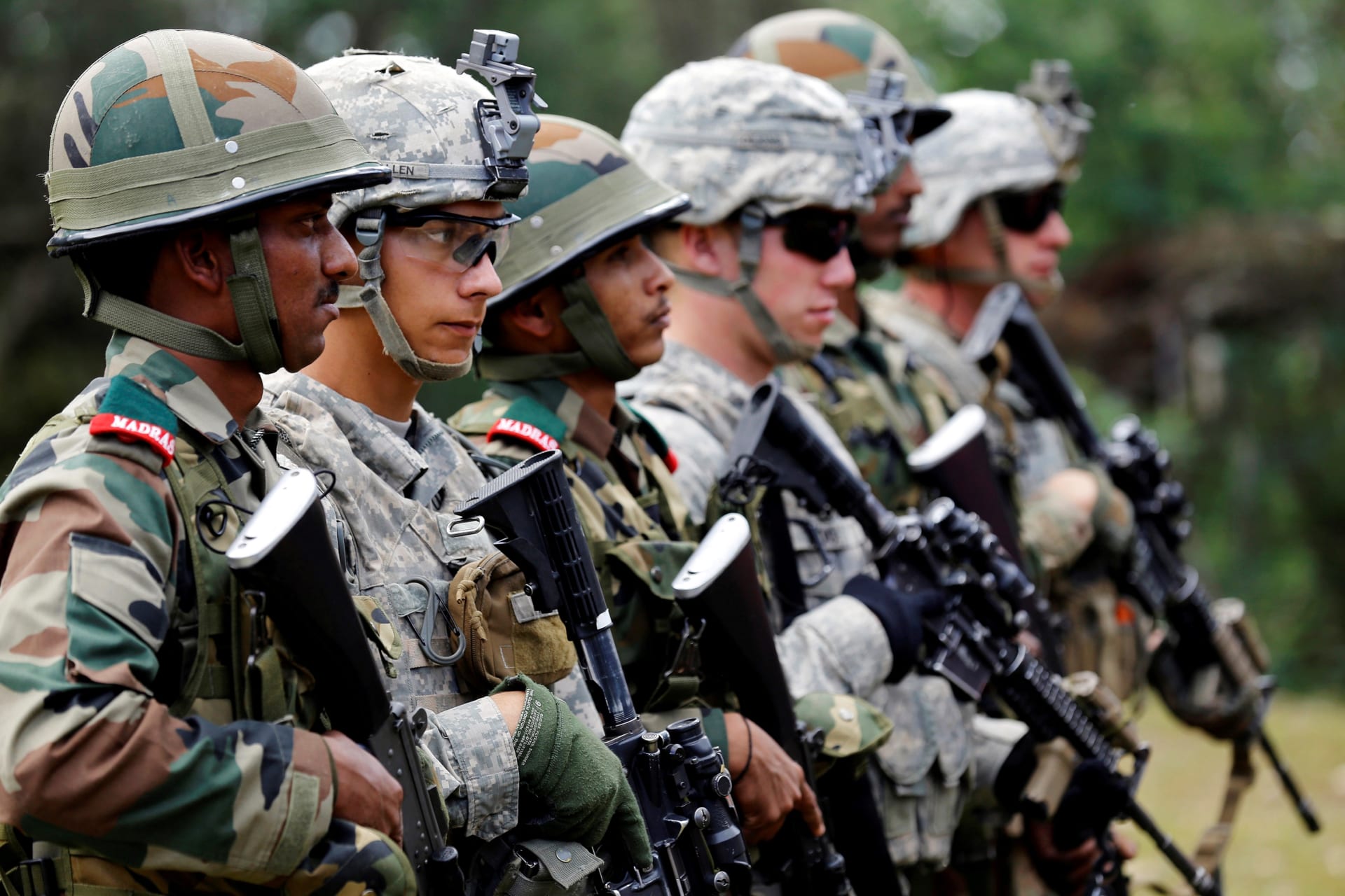 <p>Indian and U.S. army soldiers take part in an Indo-US army joint combat exercise in Ranikhet, in the Himalayan state of Uttarakhand, India, September 25, 2016.</p>
