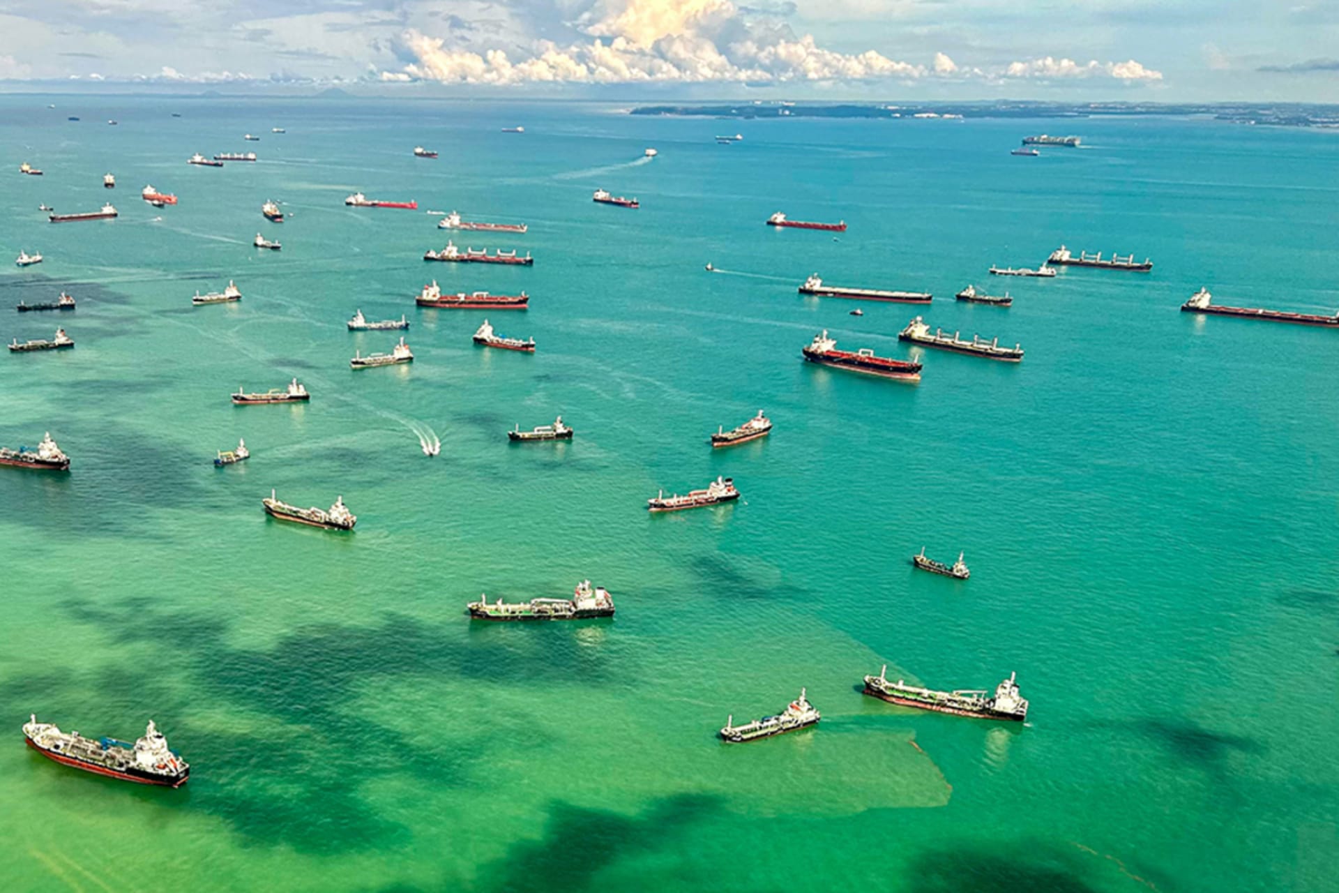 <p>Cargo ships in the Singapore Strait</p>
