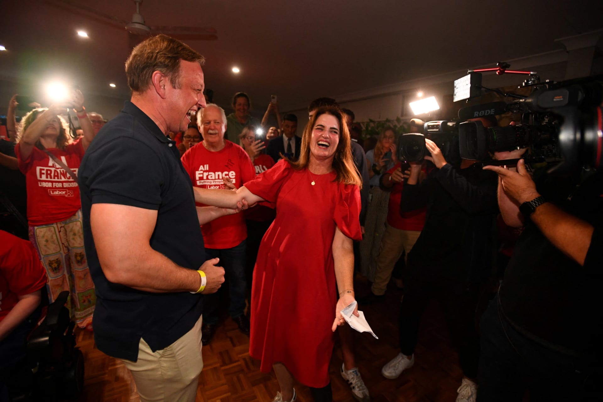 <p>Ali France of the Labor Party celebrates with former Queensland Premier Steven Miles and supporters at Kallangur Bowls club, on the day of the Australian federal election, Kallangur, Australia, May 3, 2025.</p>
