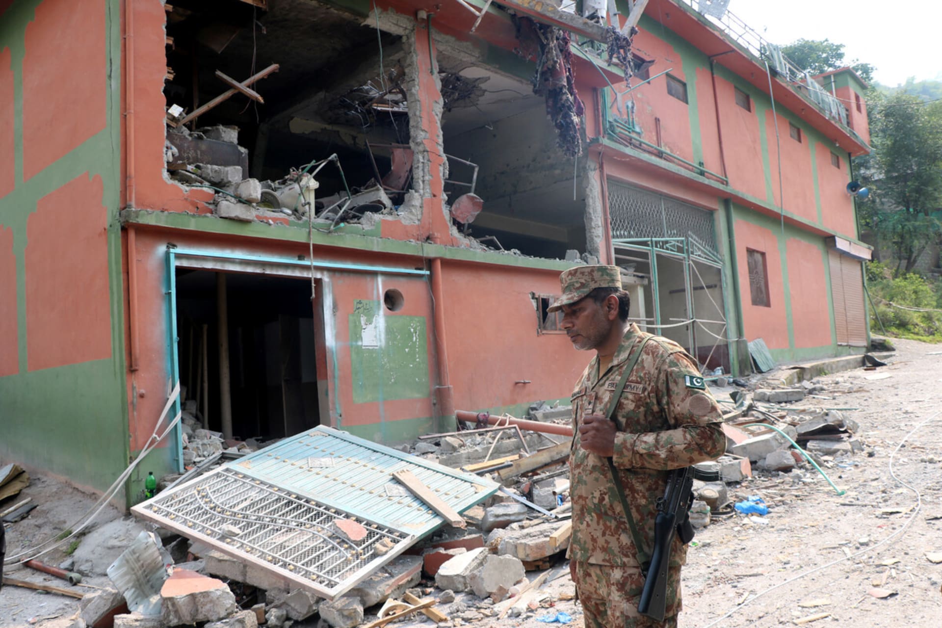 <p>A Pakistani soldier surveys damage Bilal Mosque after it was hit by an Indian strike in Muzaffarabad, the capital of Pakistan-administered Kashmir, May 7, 2025.</p>
