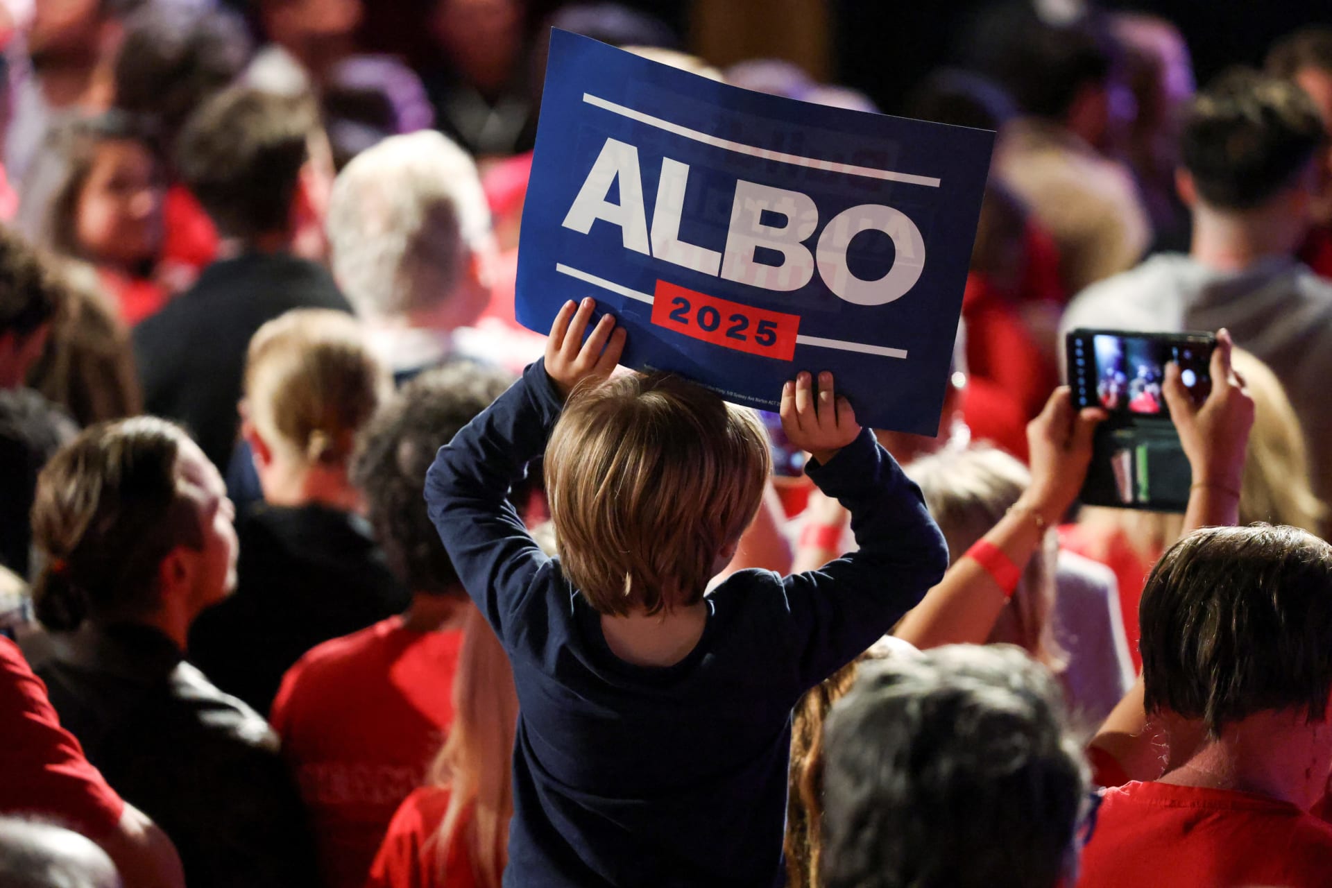 <p>A child holds a placard at a Labor party election night event, on the day of the Australian federal election, in Sydney on May 3, 2025</p>
