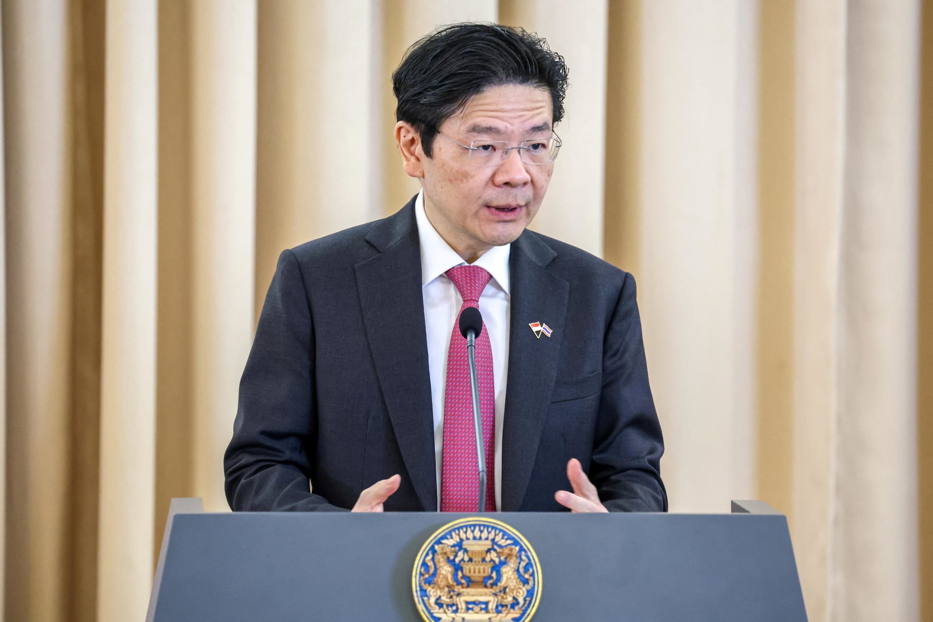 <p>Singapore’s Prime Minister Lawrence Wong speaks during a signing ceremony and press conference at the Government House in Bangkok, Thailand, November 28, 2024.</p>
