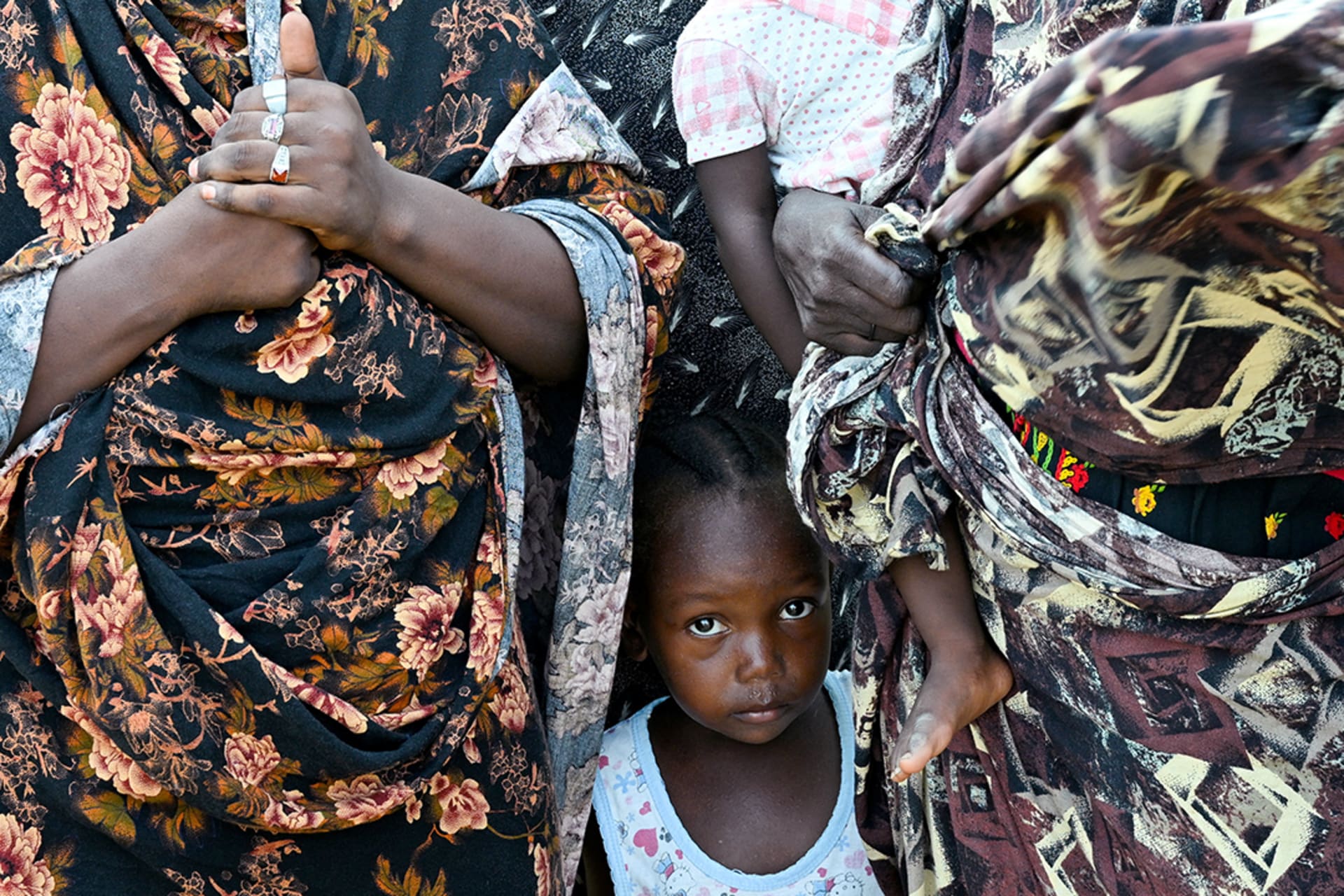 <p>Amid a landscape of destruction, displaced Sudanese take refuge at a school-turned-shelter in Port Sudan.</p>
