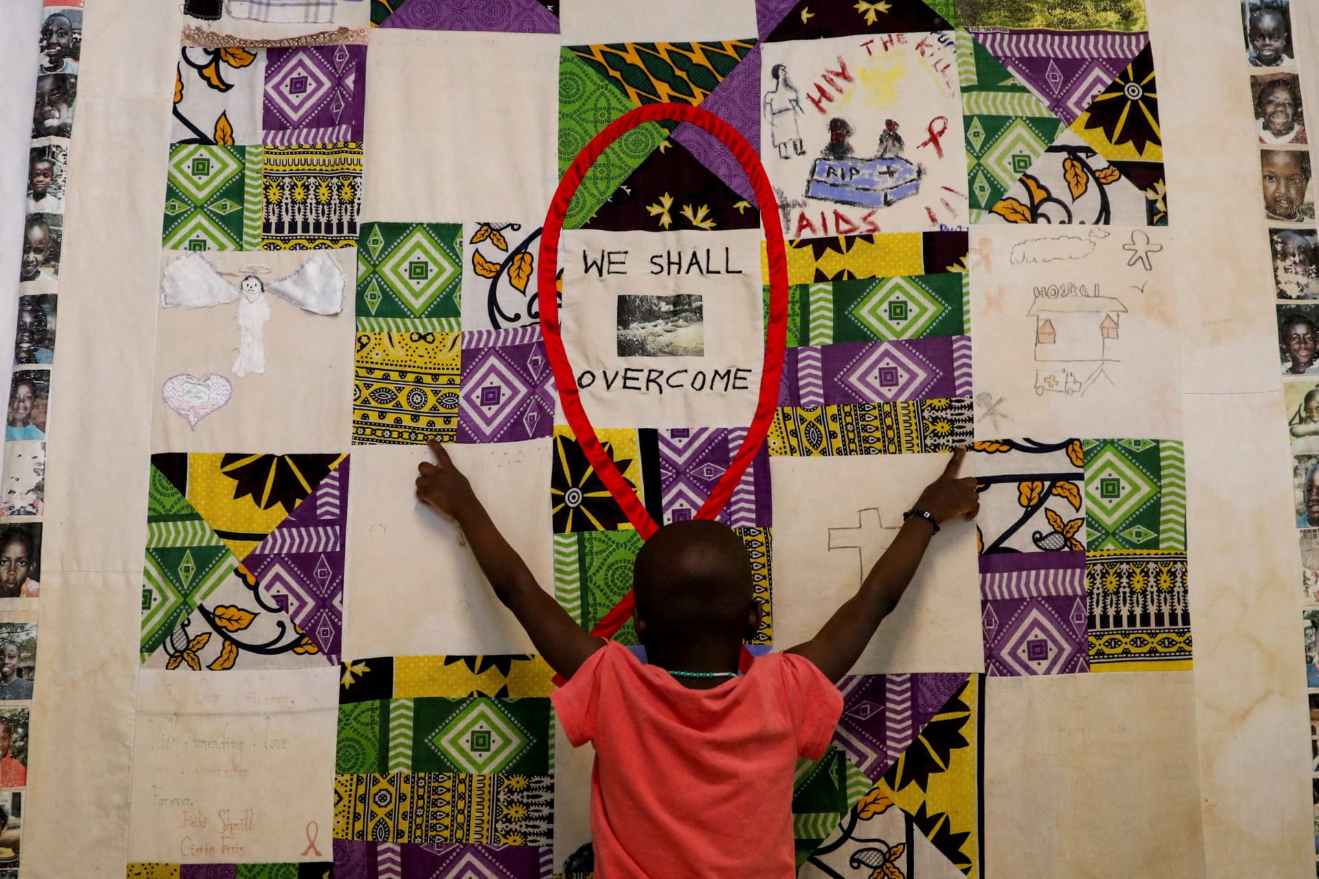 <p>A child plays at an advocacy wall after receiving a dose of PEPFAR-sponsored antiretroviral drugs used to prevent HIV from replicating, at the Nyumbani Children’s Home in the Karen district of Nairobi, Kenya on February 12, 2025.</p>
