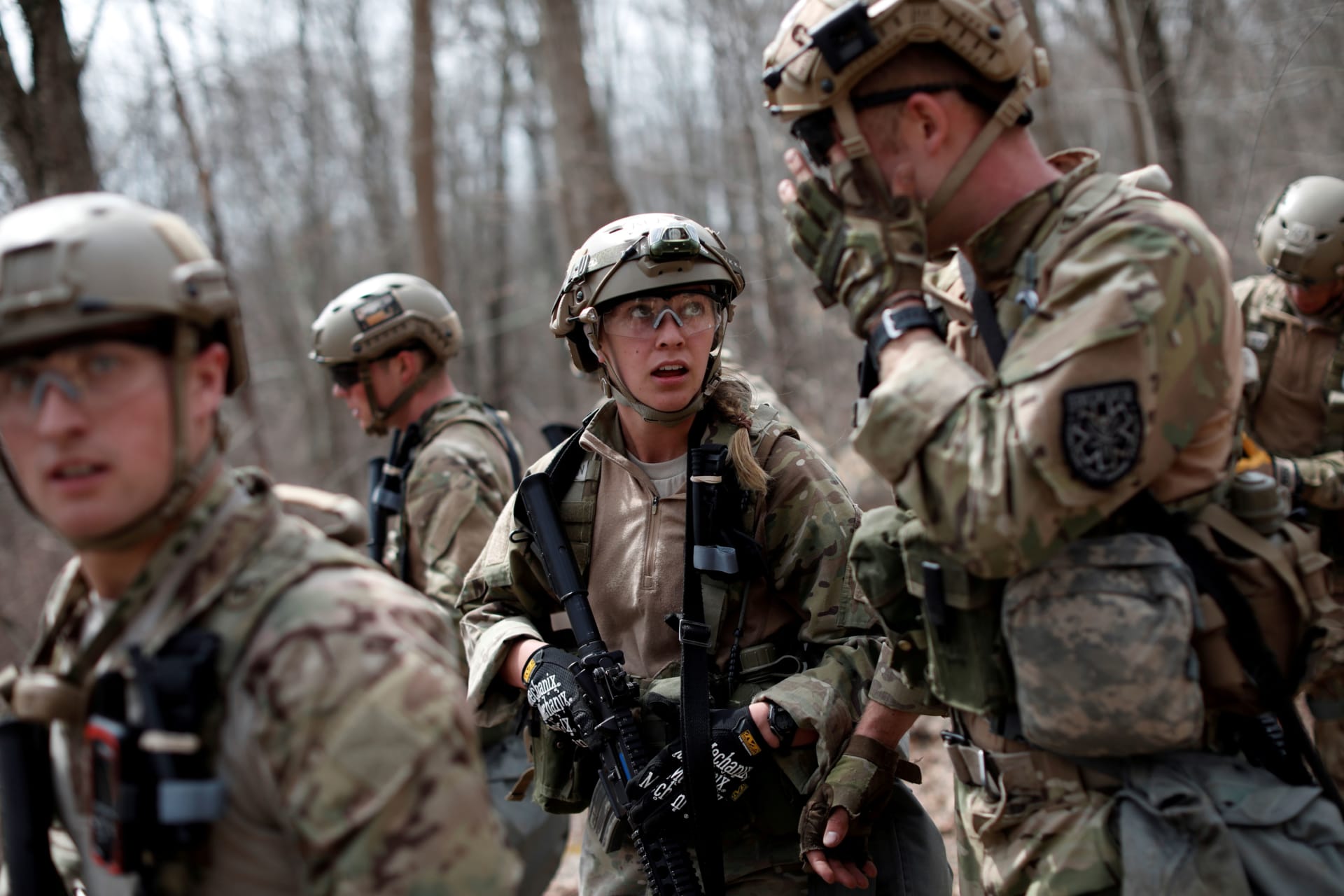 <p>A U.S. military cadet team competes on the Squad Assault course during the 50th annual Sandhurst Military Skills Competition, a rigorous two-day event where teams of eight men and women from military academies and universities from 13 countries are tested</p>

