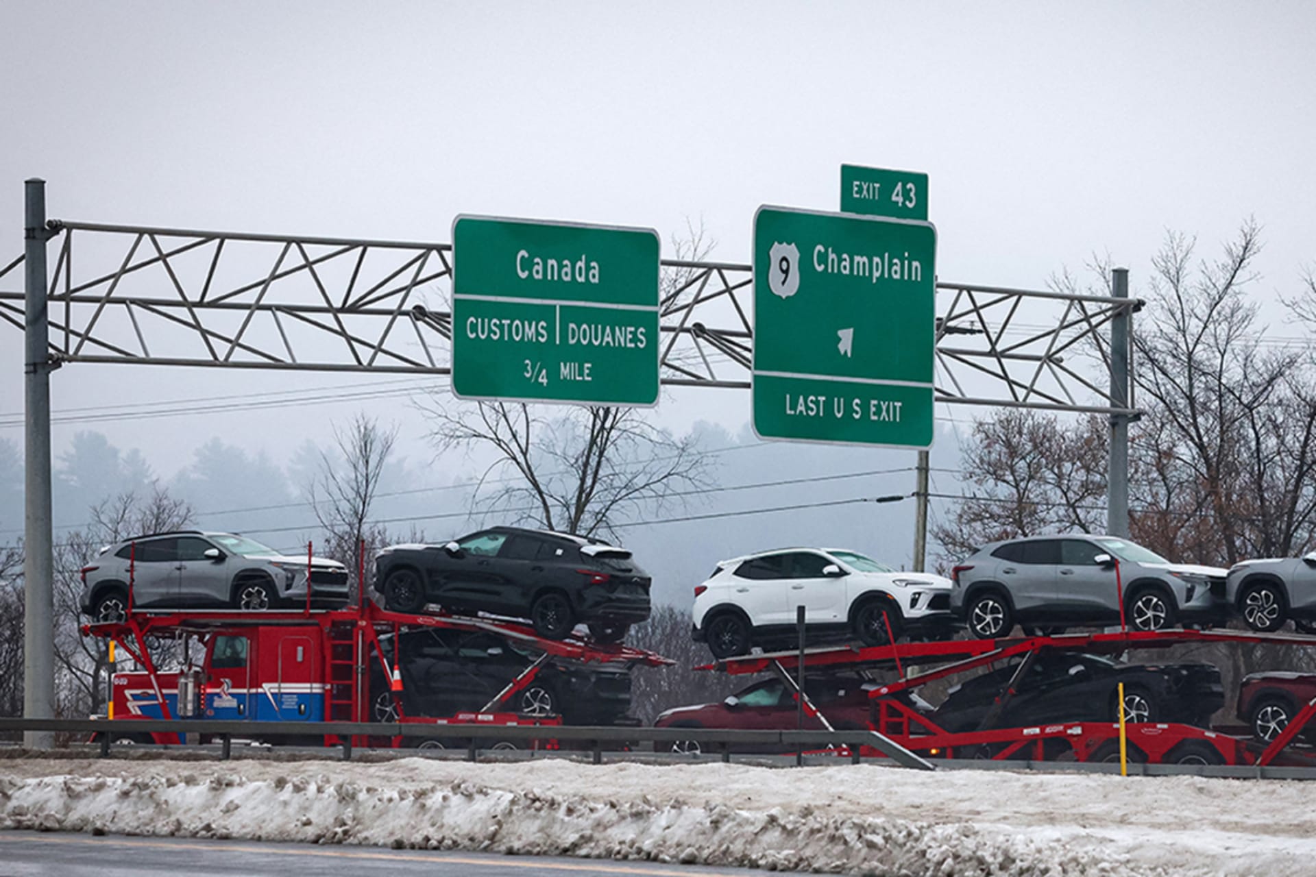 <p>A car carrier trailer crosses the border from the U.S. to Canada as seen from Champlain, New York, U.S., March 5, 2025.</p>
