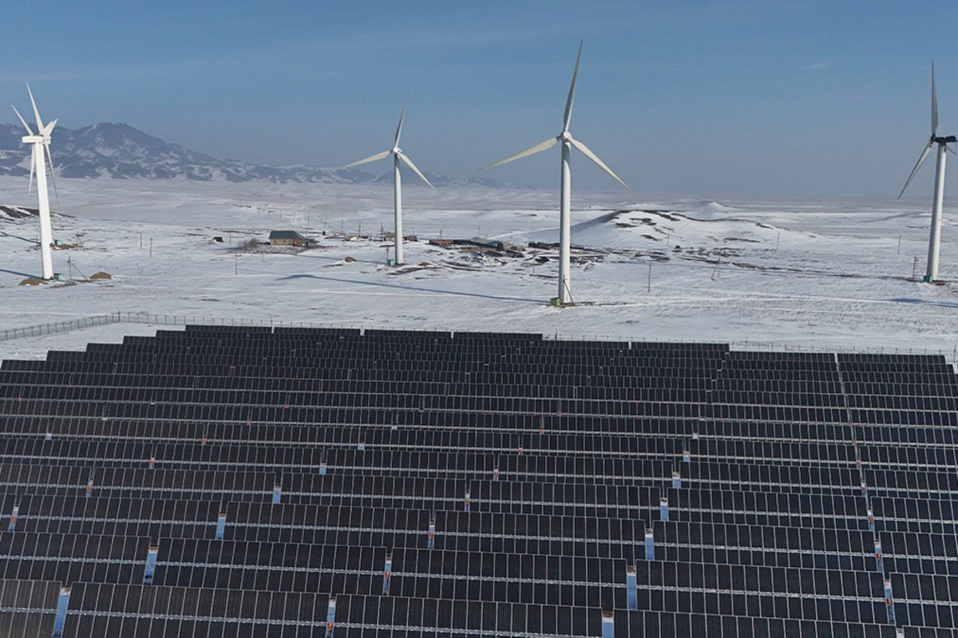 <p>A drone view shows a solar power plant and wind turbines in Kazakhstan’s Almaty region.</p>
