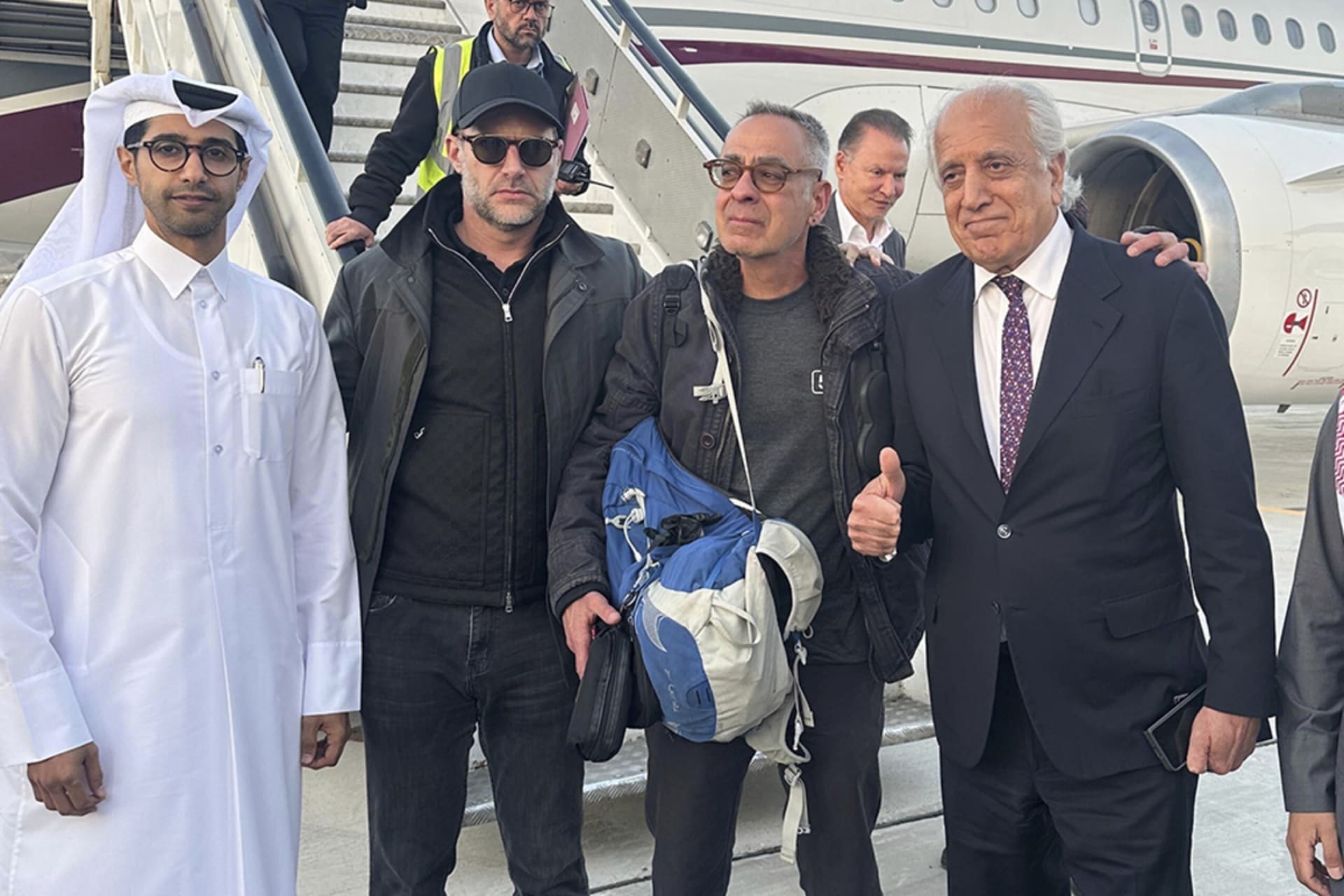 <p>George Glezmann, center, poses with Adam Boehler, second left, and Zalmay Khalilzad, second right, and Qatari diplomats in Kabul, Afghanistan, Thursday, March 20, 2025, before departing to Doha, Qatar.</p>