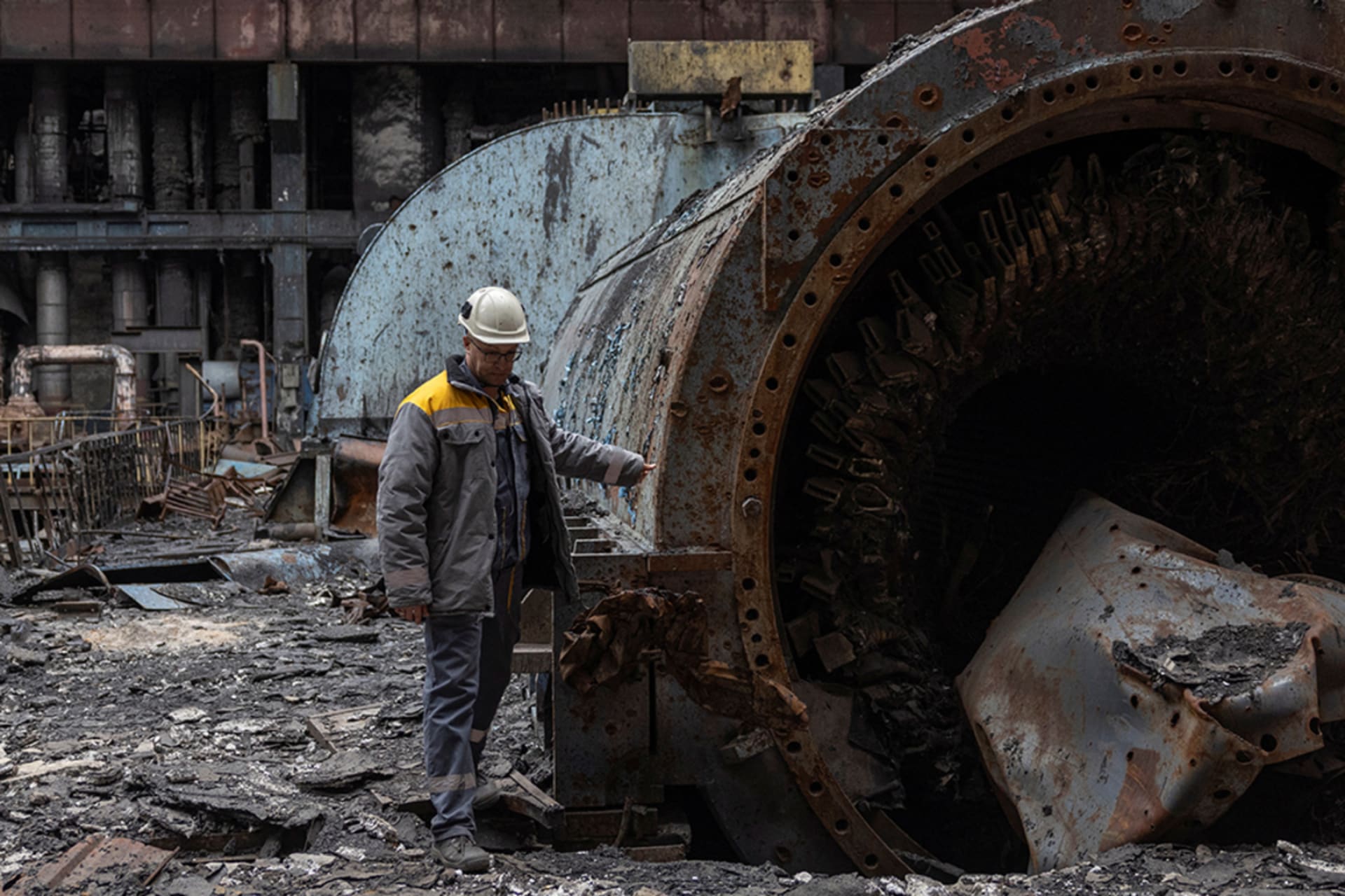 <p>An employee walks next to a turbine at a thermal power plant damaged by multiple Russian missile strikes, amid Russia’s attack on Ukraine, in an undisclosed location in Ukraine March 17, 2025.</p>
