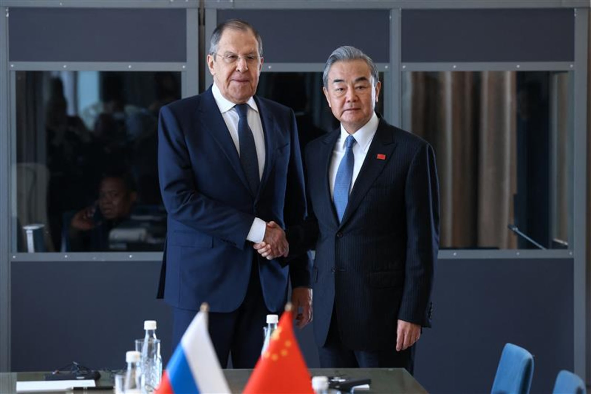 <p>Russian Foreign Minister Sergei Lavrov shakes hands with Chinese Foreign Minister Wang Yi during a meeting on the sidelines of the Group of Twenty (G20) Summit.</p>
