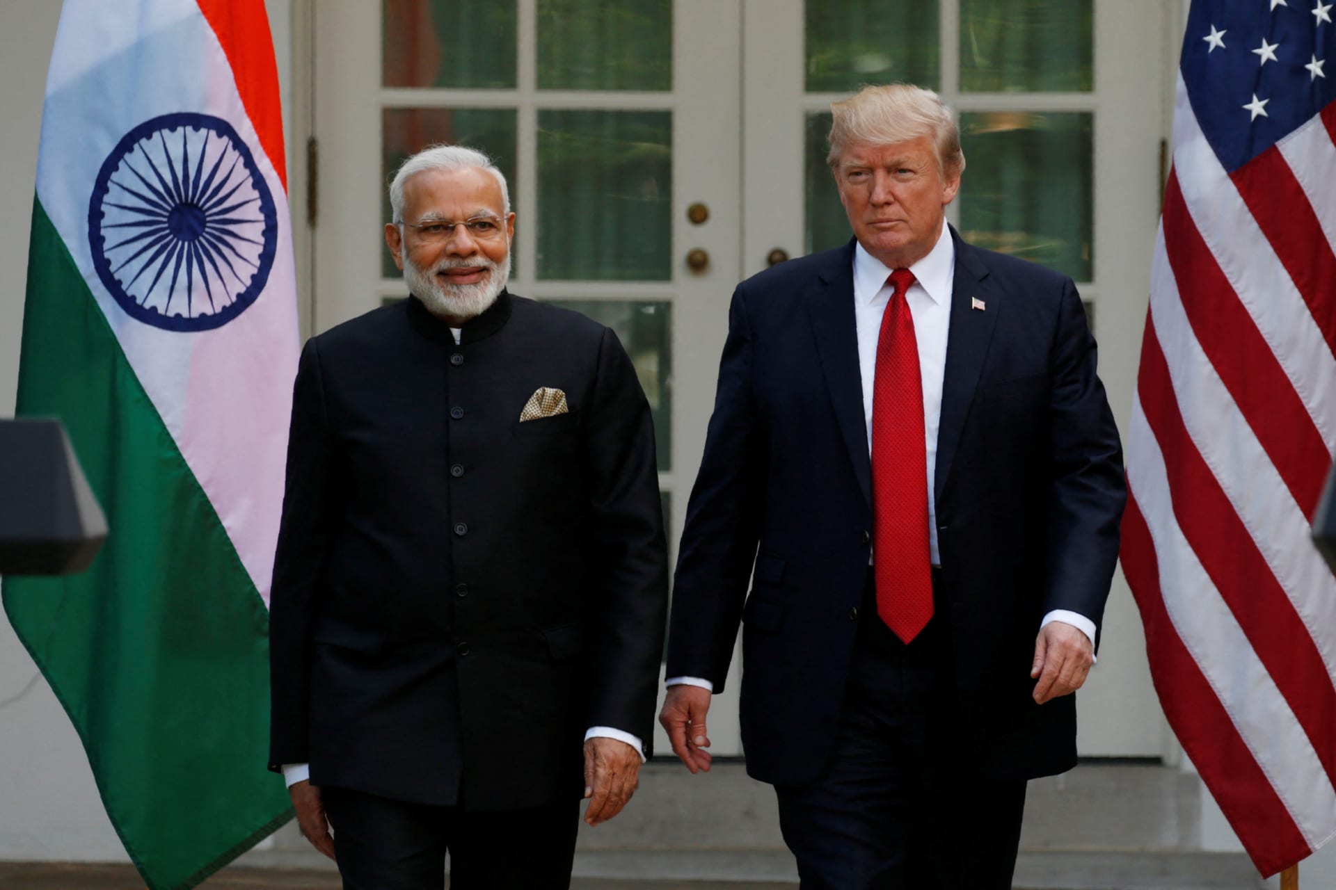 <p>U.S. President Donald Trump (R) arrives for a joint news conference with Indian Prime Minister Narendra Modi in the Rose Garden of the White House in Washington, U.S., June 26, 2017.</p>
