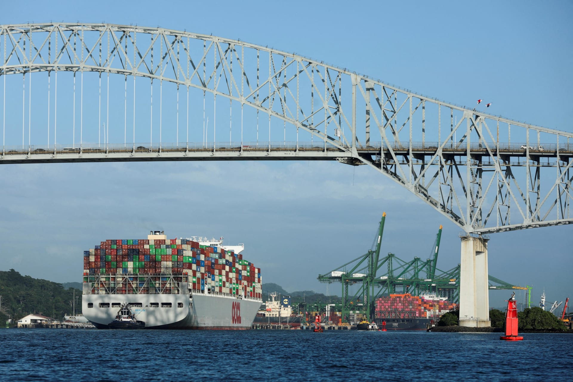 <p>A cargo ship sails underneath the Bridge of the Americas, which spans the entrance to the Panama Canal in Panama City, Panama, January 22, 2025.  </p>
