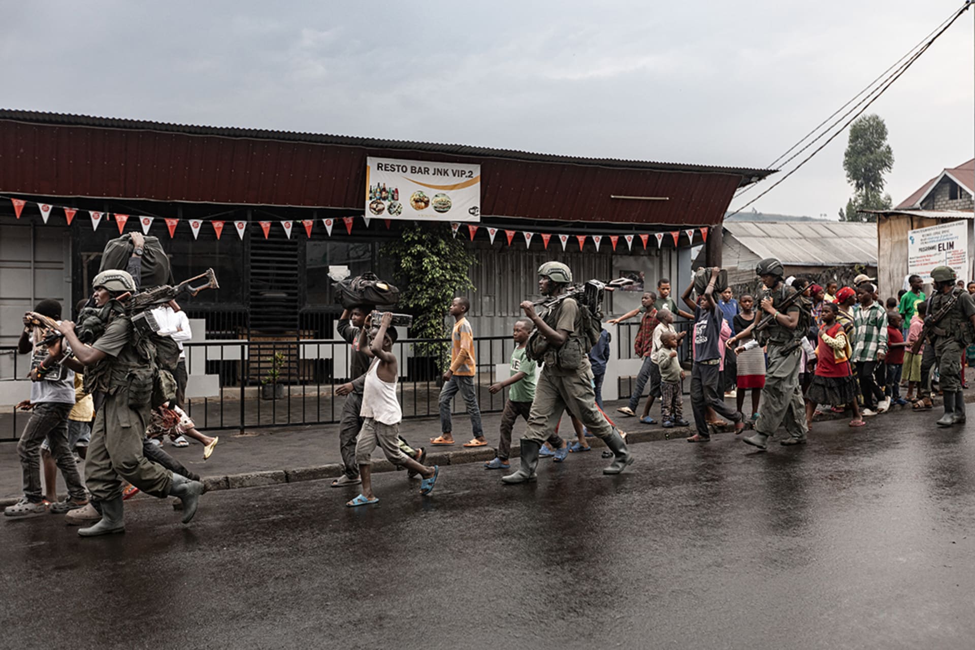 <p>Members of the M23 armed group walk through a street of the Keshero neighborhood in Goma, Democratic Republic of Congo on January 27, 2025.</p>
