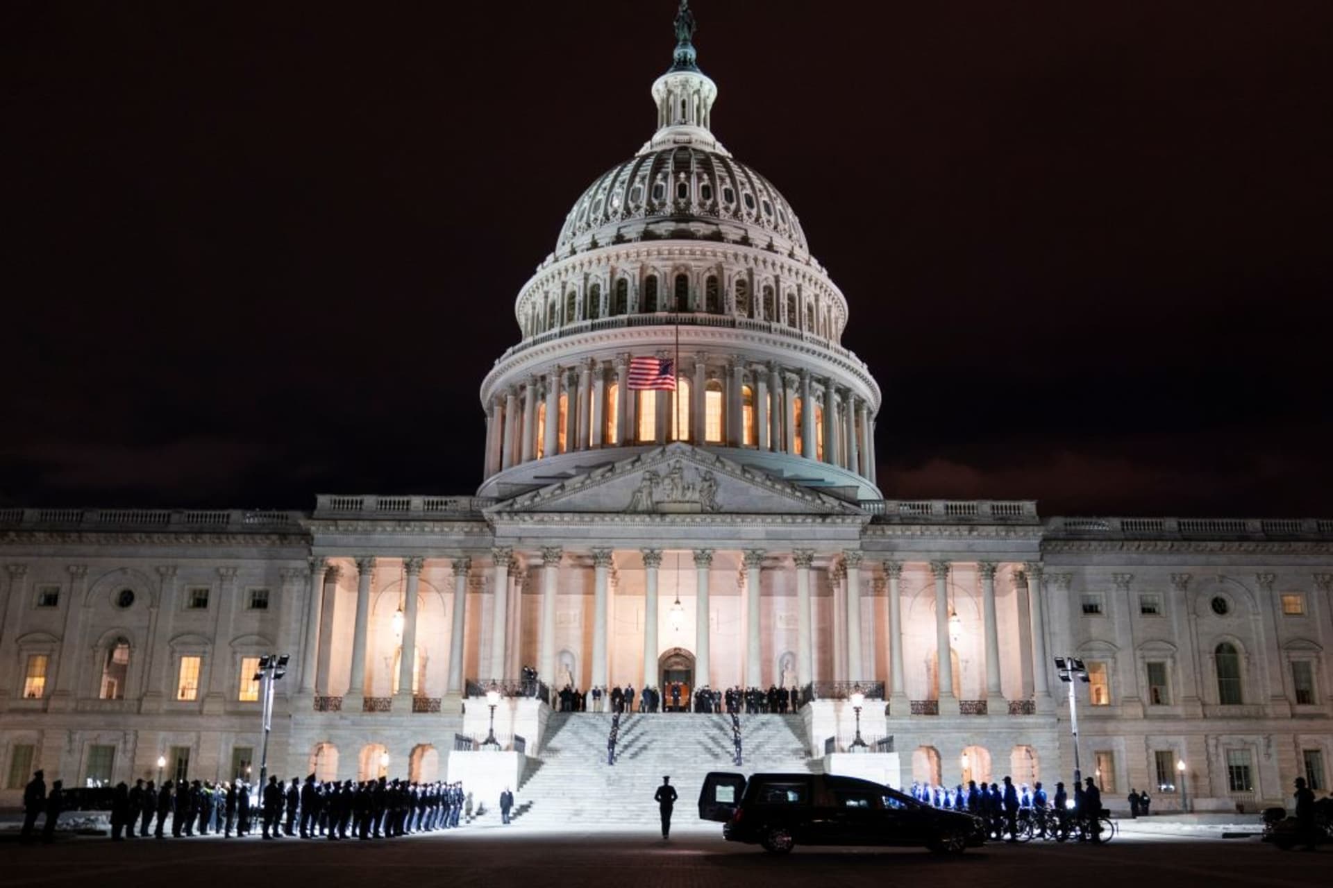 <p>The remains of a Capitol Police Officer who died from injuries inflicted on the January 6th insurrection is carried up the U.S. Capitol in Washington, DC, in February 2021.</p>
