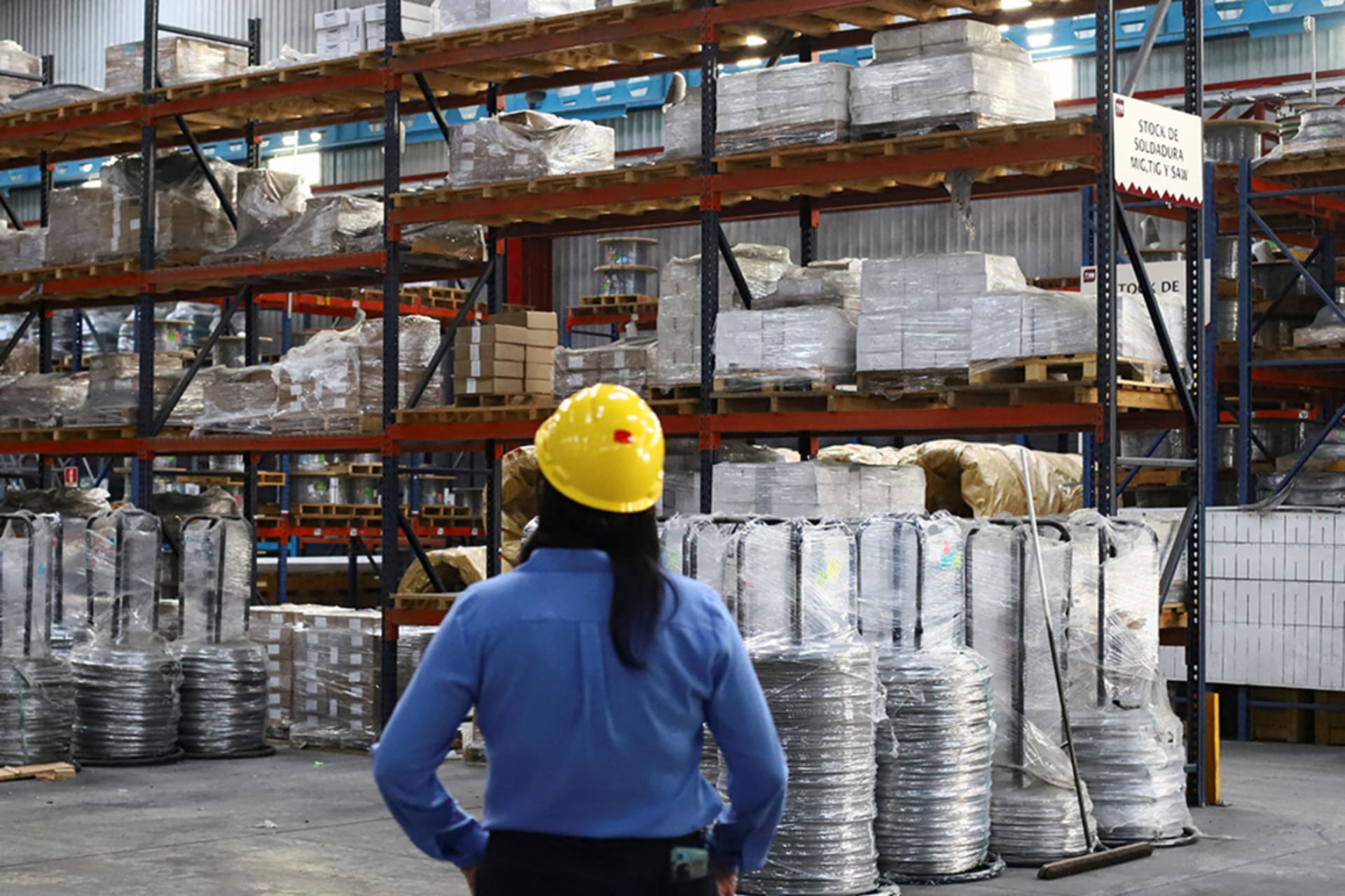 <p>An employee works at Trefilados Inoxidables de México, which exports manufactured aluminum, nickel alloys, and stainless steel wire to the United States, in Tlaxcala, Mexico.</p>
