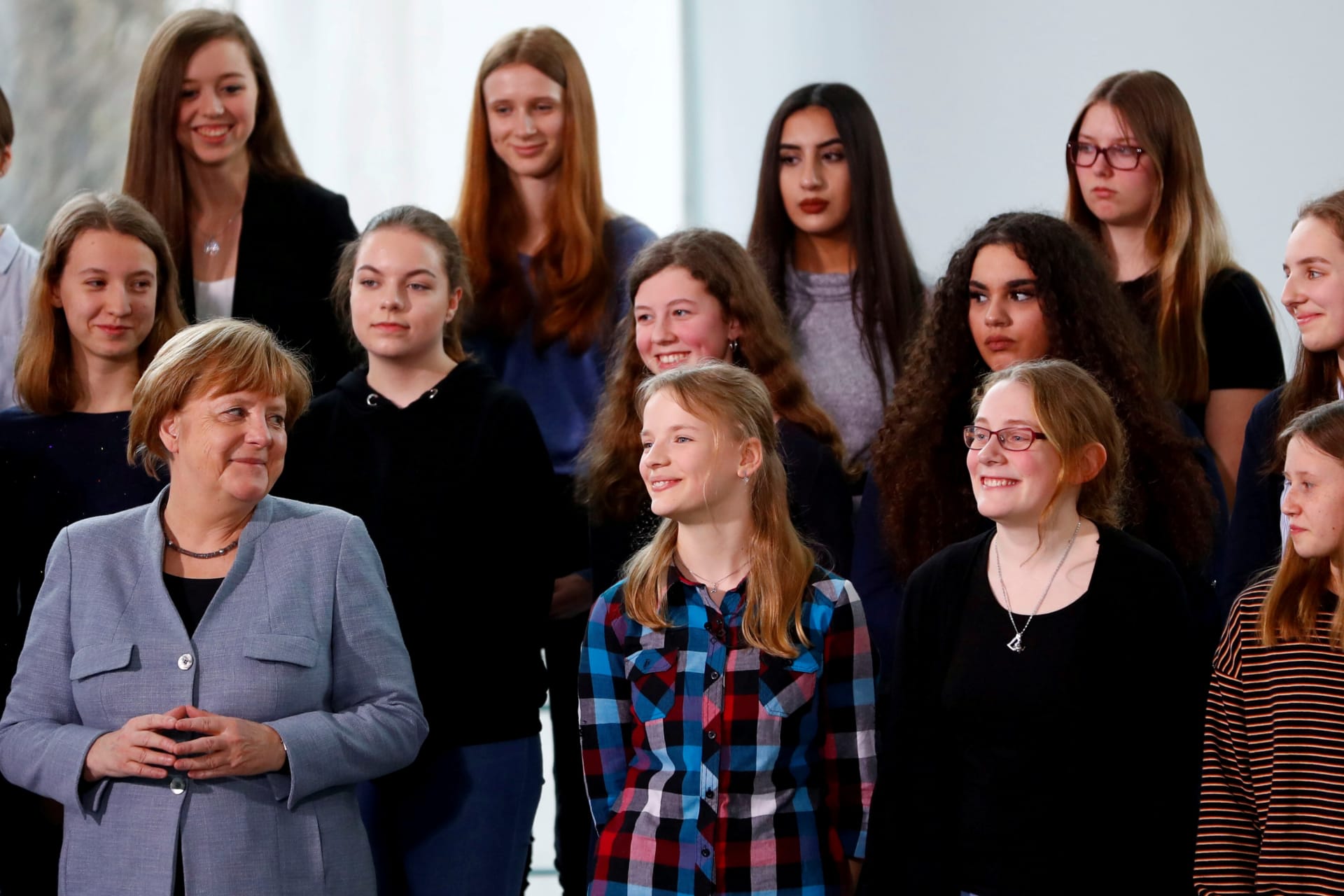 <p>German Chancellor Angela Merkel talks to a participant of a Girls’ Day career event at the Chancellery to attract female pupils to careers in IT, technological and natural science sectors of the German industry in Berlin, Germany, March 27, 2019. </p>
