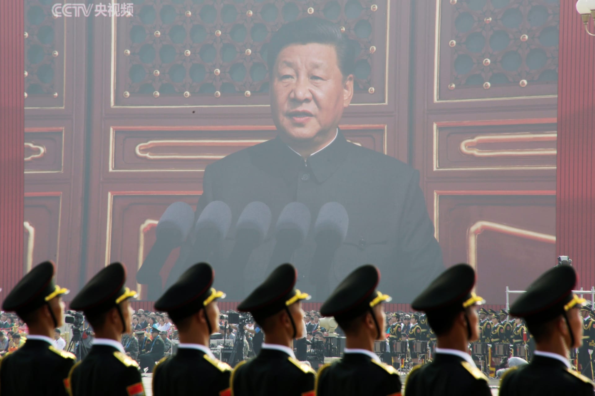 <p>Soldiers of People’s Liberation Army (PLA) are seen before a giant screen as Chinese President Xi Jinping speaks at the military parade marking the 70th founding anniversary of People’s Republic of China.</p>
