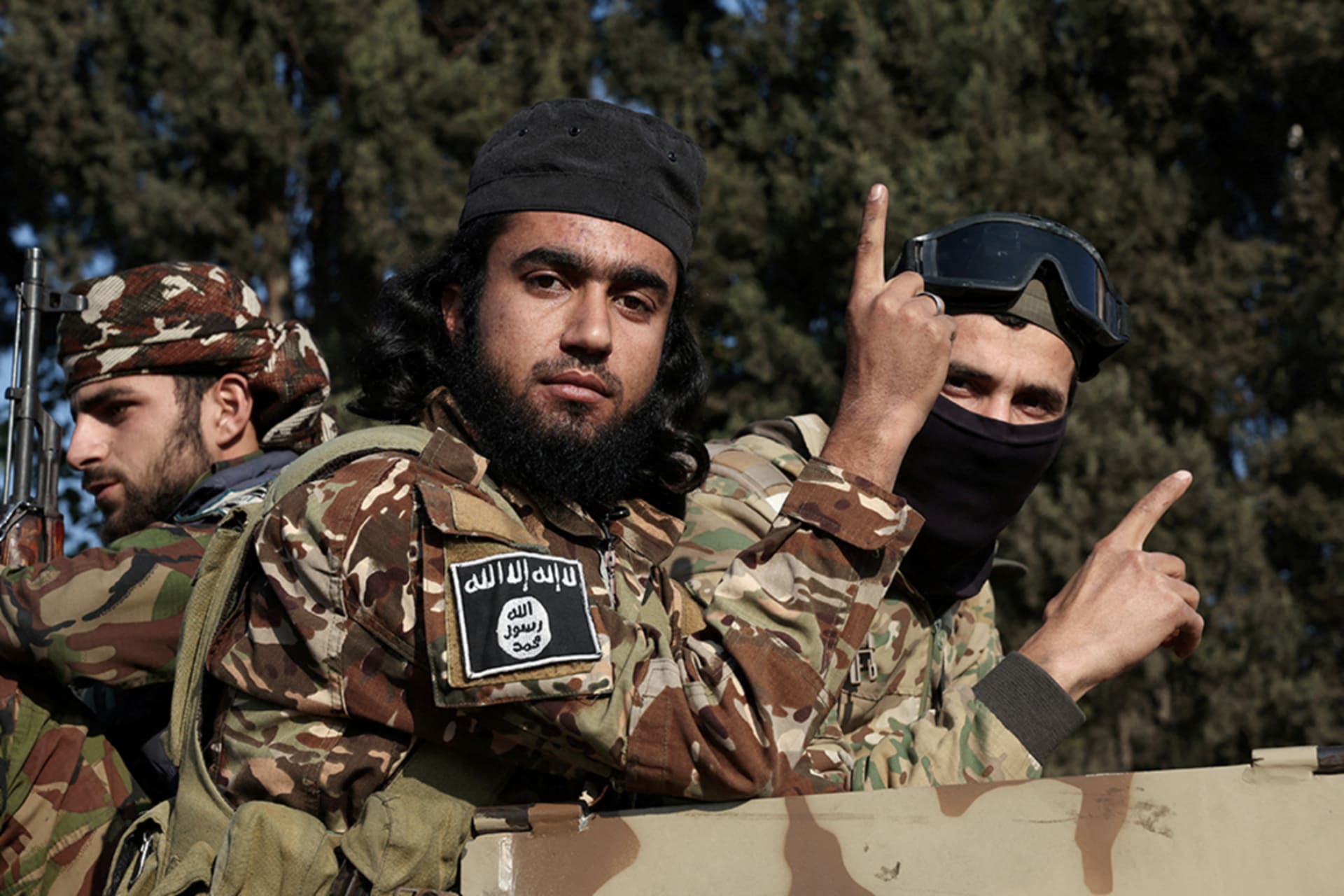 <p>Rebel fighters ride in a vehicle after they seized Damascus and ousted President Bashar in Syria, December 9, 2024.</p>

