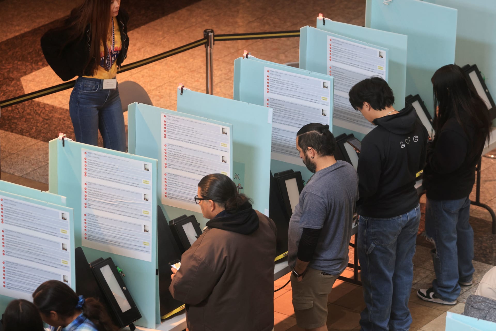 <p>People cast their votes in the 2024 U.S. presidential election on Election Day at Galleria At Sunset mall in Henderson, Nevada on November 5, 2024</p>
