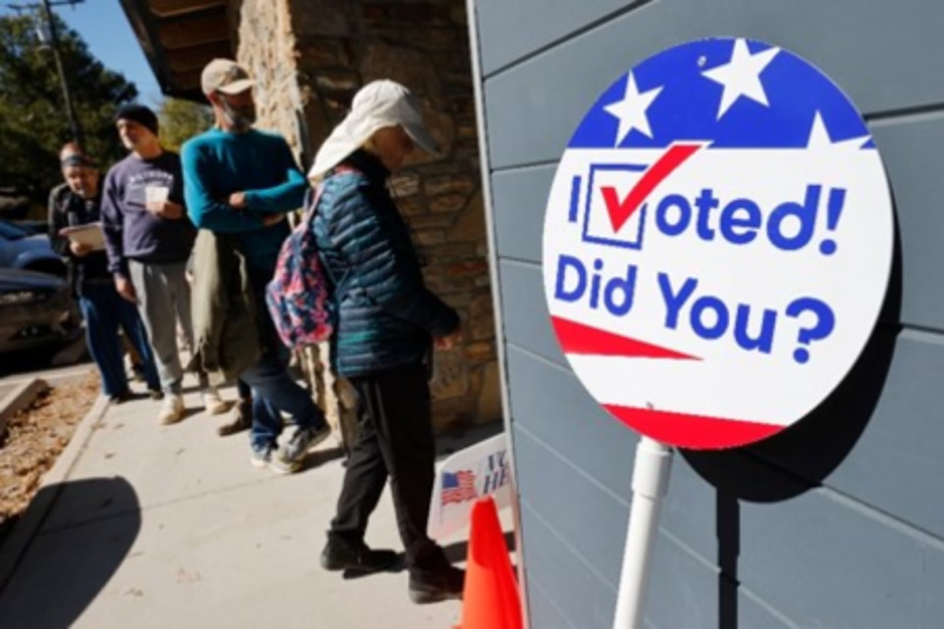 <p>Voters line up on the first day of early in-person voting in Asheville, North Carolina, on October 17, 2024.</p>
