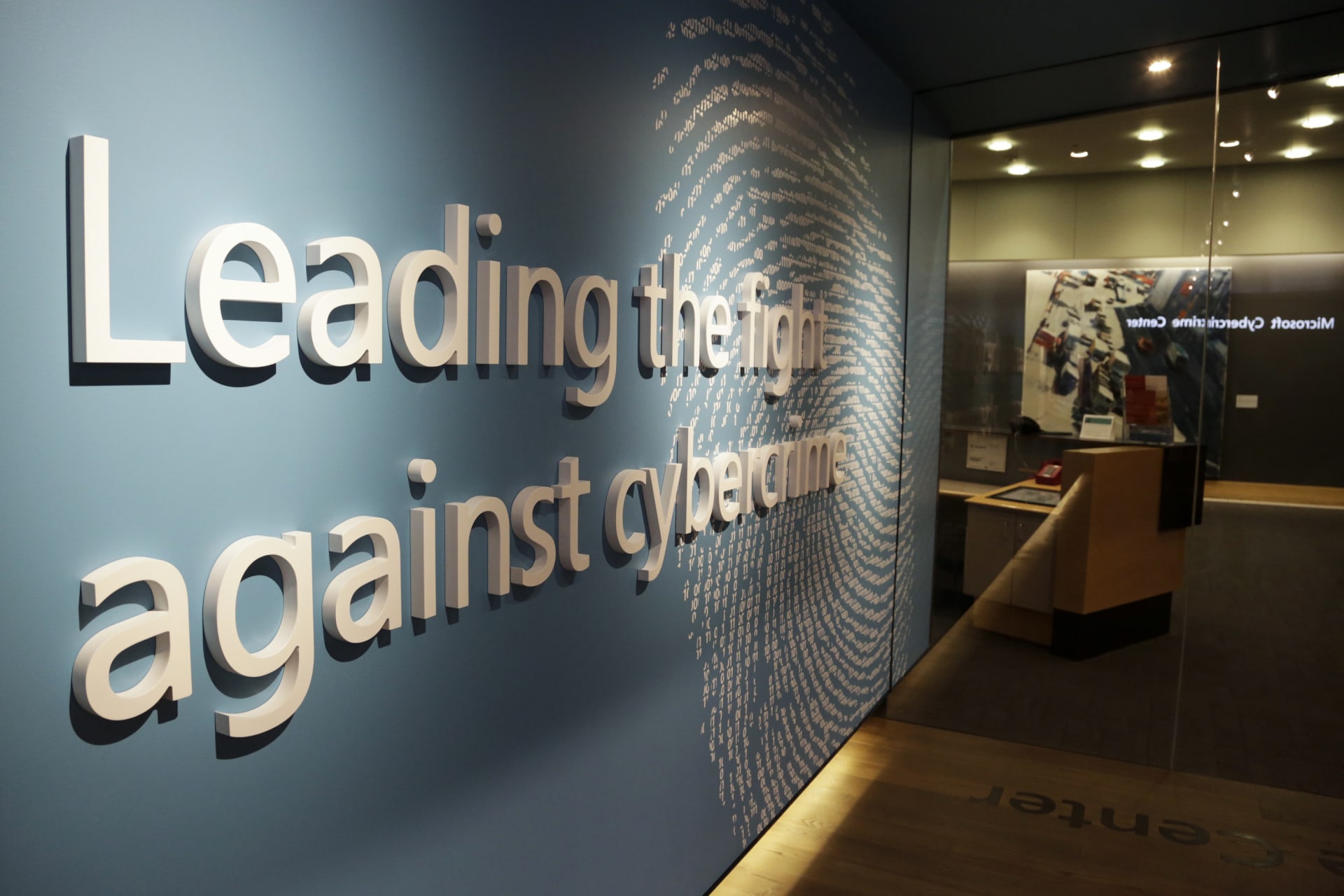 <p>A sign is pictured in the hallway of the Microsoft Cybercrime Center, the new headquarters of the Microsoft Digital Crimes Unit, in Redmond, Washington on November 11, 2013.</p>
