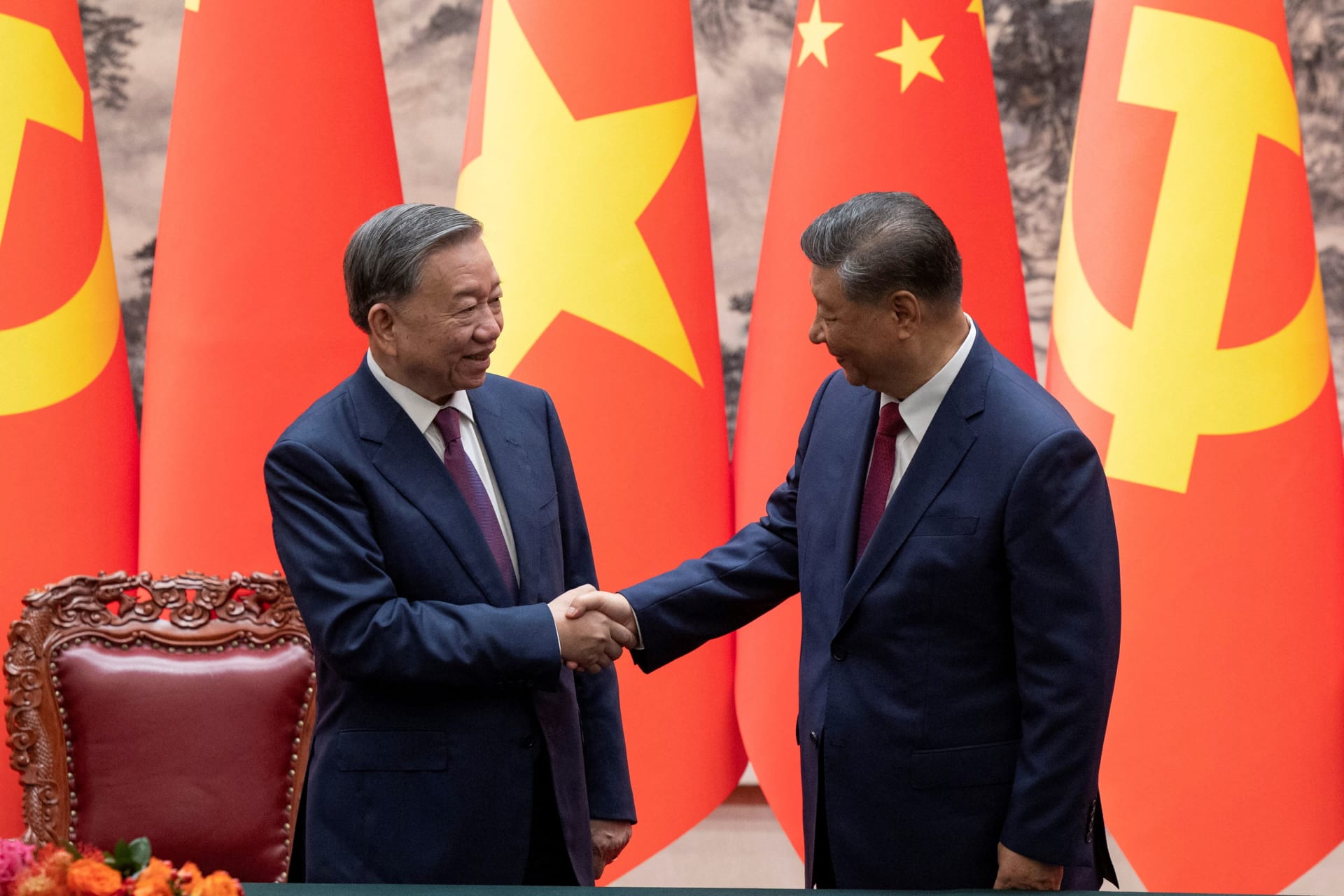 <p>Chinese President Xi Jinping and Vietnam’s President To Lam shake hands after a signing ceremony at the Great Hall of the People in Beijing, China, on August 19, 2024.</p>
