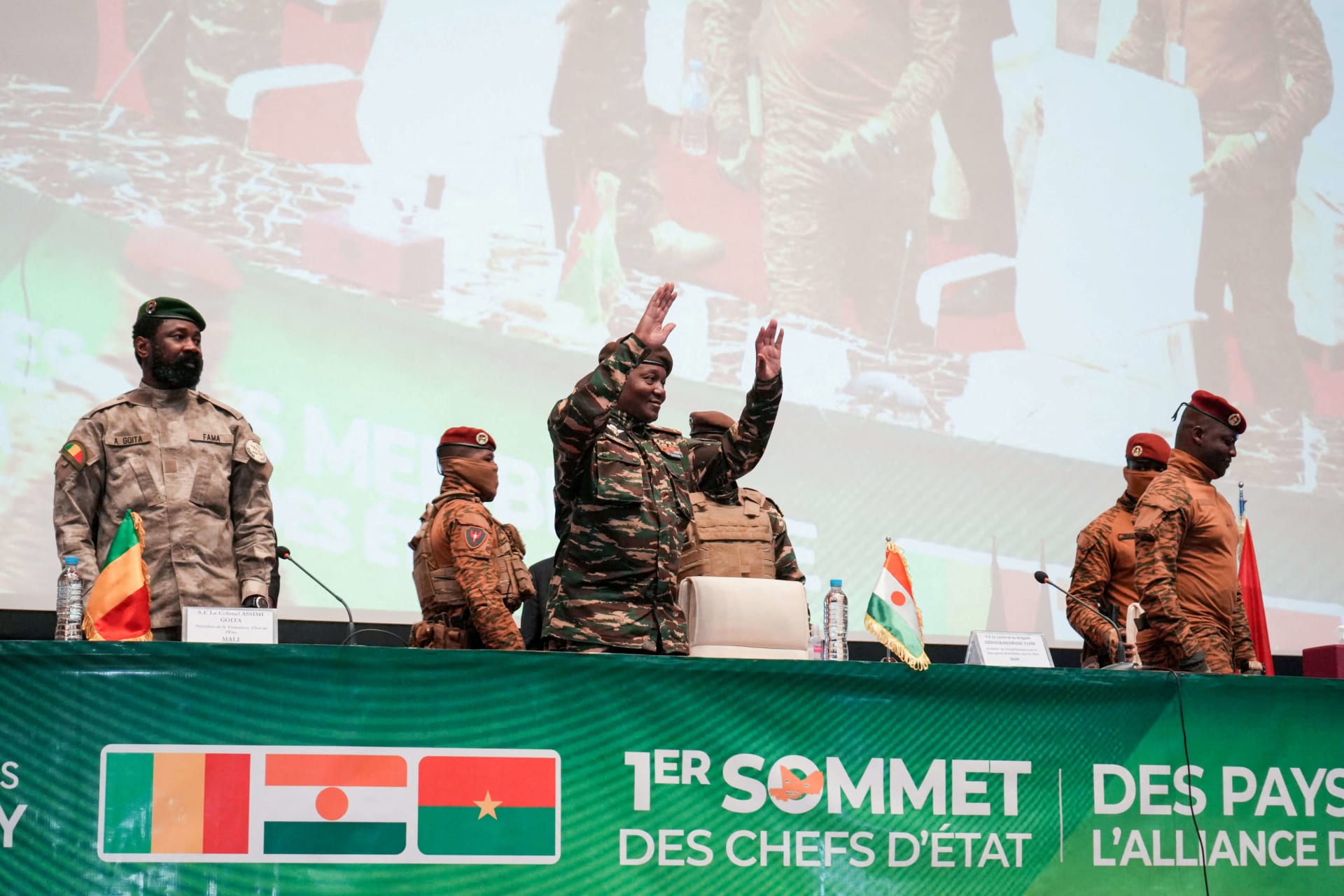 <p>Niger’s junta leader Gen. Abdourahamane Tchiani reacts as Mali’s Assimi Goïta and Burkina Faso’s Capt. Ibrahim Traoré stand during the first ordinary summit of heads of state and governments of the AES on July 6, 2024 in Niamey, Niger.</p>
