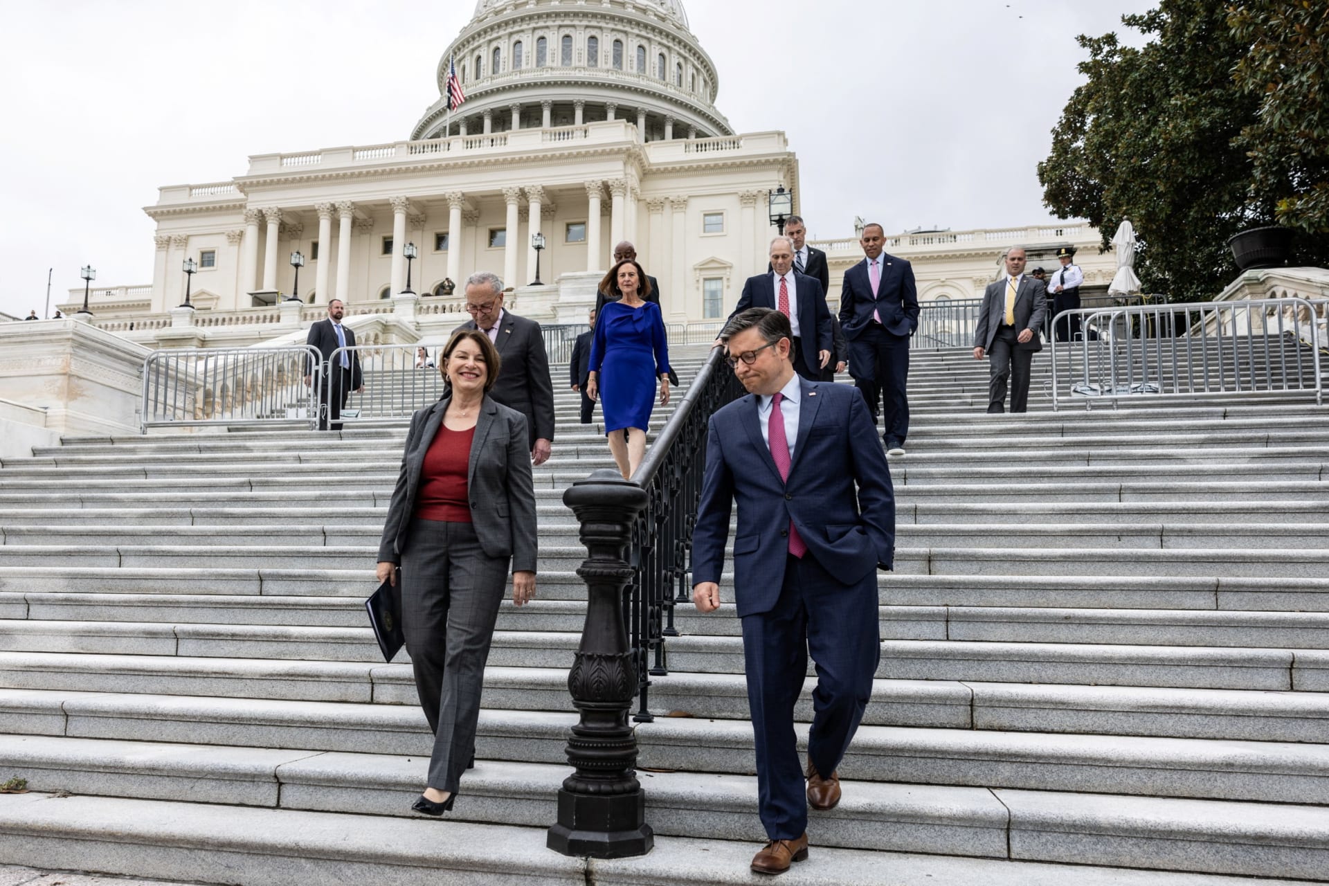 <p>Speaker of the House Mike Johnson, Senator Amy Klobuchar, and other members of the Joint Congressional Committee on Inaugural Ceremonies attend the start of construction of the 2025 inauguration platform on Capitol Hill, September 18, 2024. </p>
