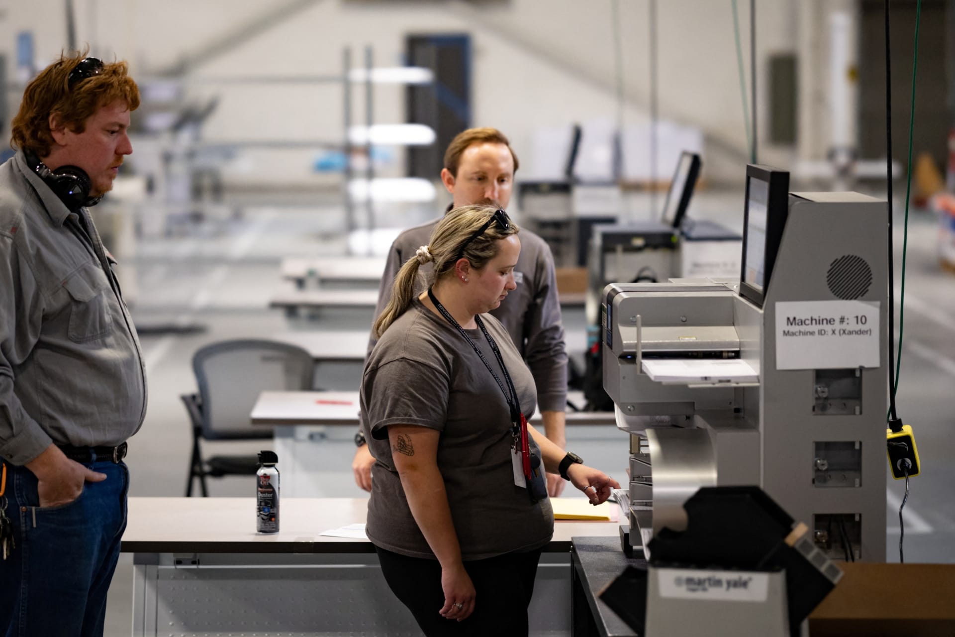 <p>Election workers in Philadelphia, Pennsylvania, scan ballots cast during the 2022 midterm election. </p>
