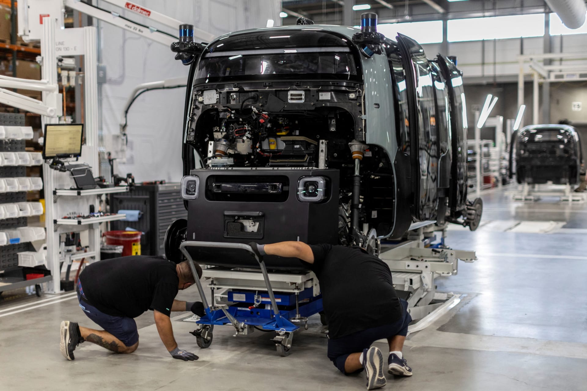 <p>Employees works at the assembly line of Zoox, a self-driving vehicle owned by Amazon at the company’s factory in Fremont, California on July 19, 2022</p>
